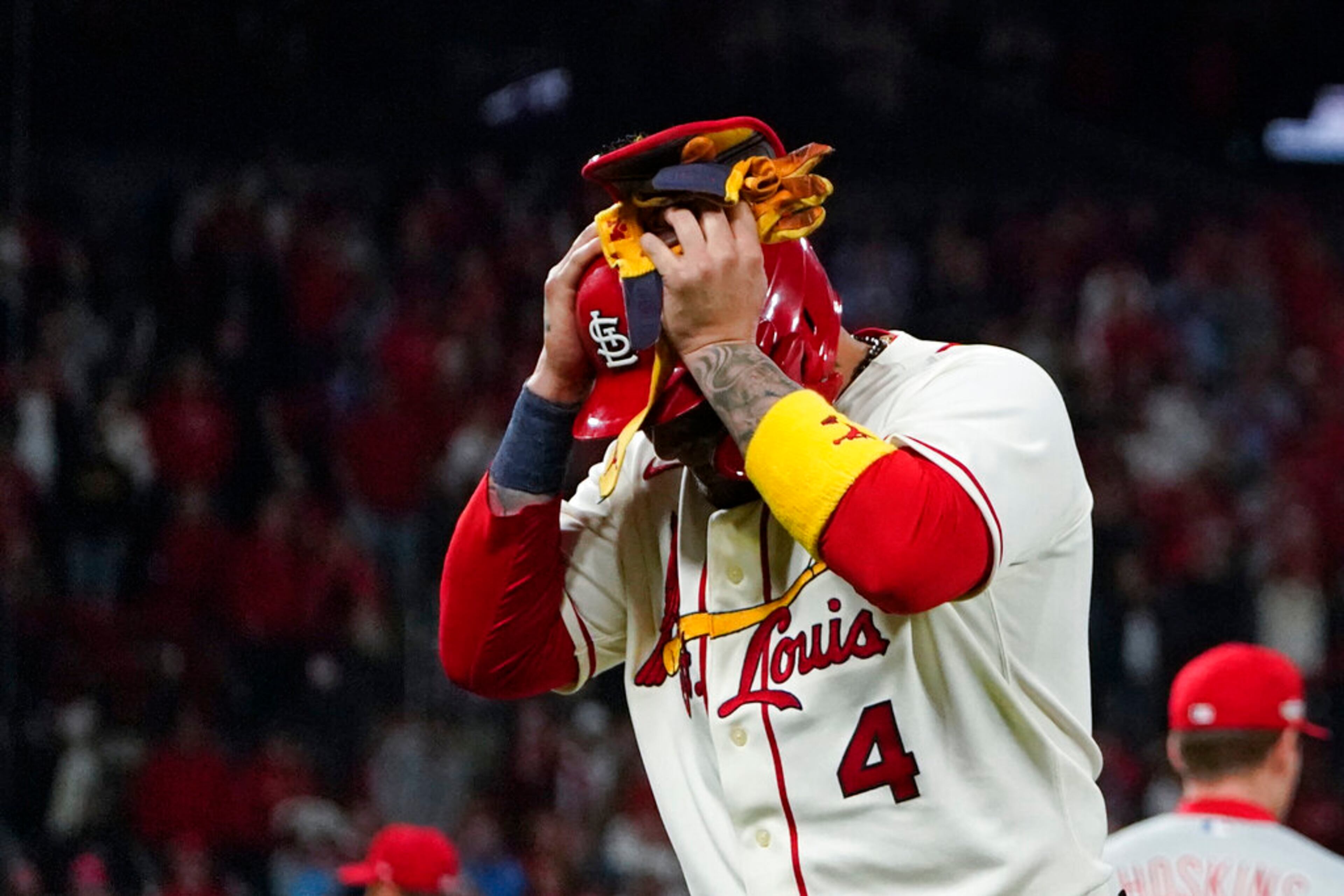 St. Louis Cardinals' Yadier Molina is removed for a pinch-runner during the ninth inning in Game 2 of the team's NL wild-card baseball playoff series against the Philadelphia Phillies, Saturday, Oct. 8, 2022, in St. Louis. The Phillies won 2-0 and advanced to the NL Division Series. (AP Photo/Jeff Roberson)