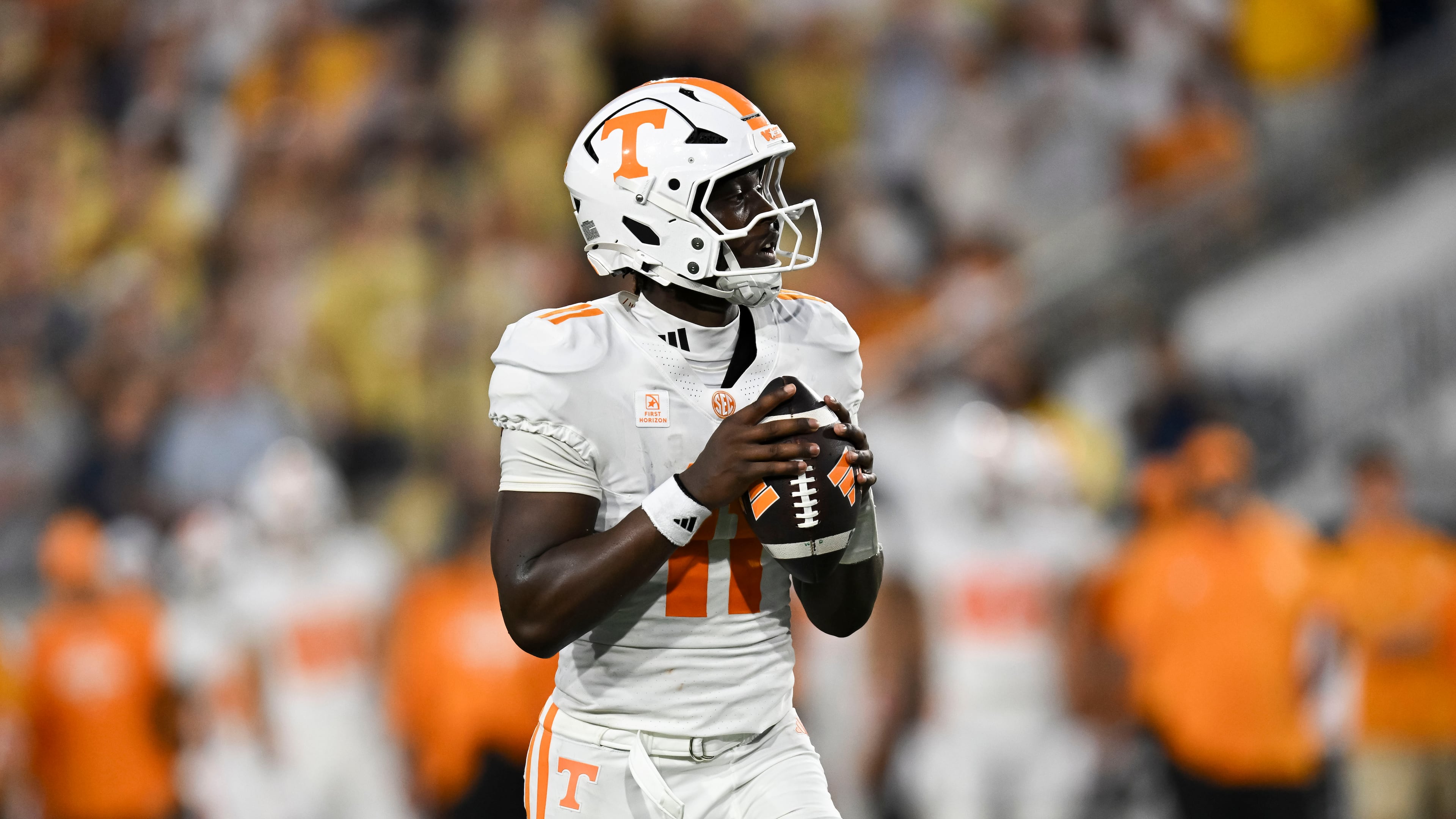 Tennessee quarterback Faizon Brandon (11) drops back for pass against Georgia Tech during the first half of an NCAA college football game against, Saturday, Sept. 12, 2026, in Atlanta. (AP Photo/Daniel Varnado)