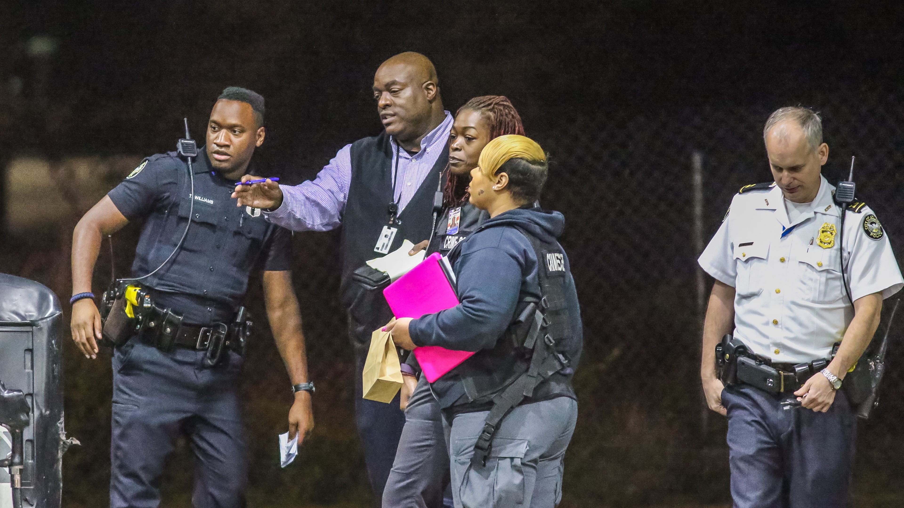 Atlanta police investigate a shooting that injured a man in the stomach Tuesday outside a Chevron on Donald Lee Hollowell Parkway. JOHN SPINK / JSPINK@AJC.COM