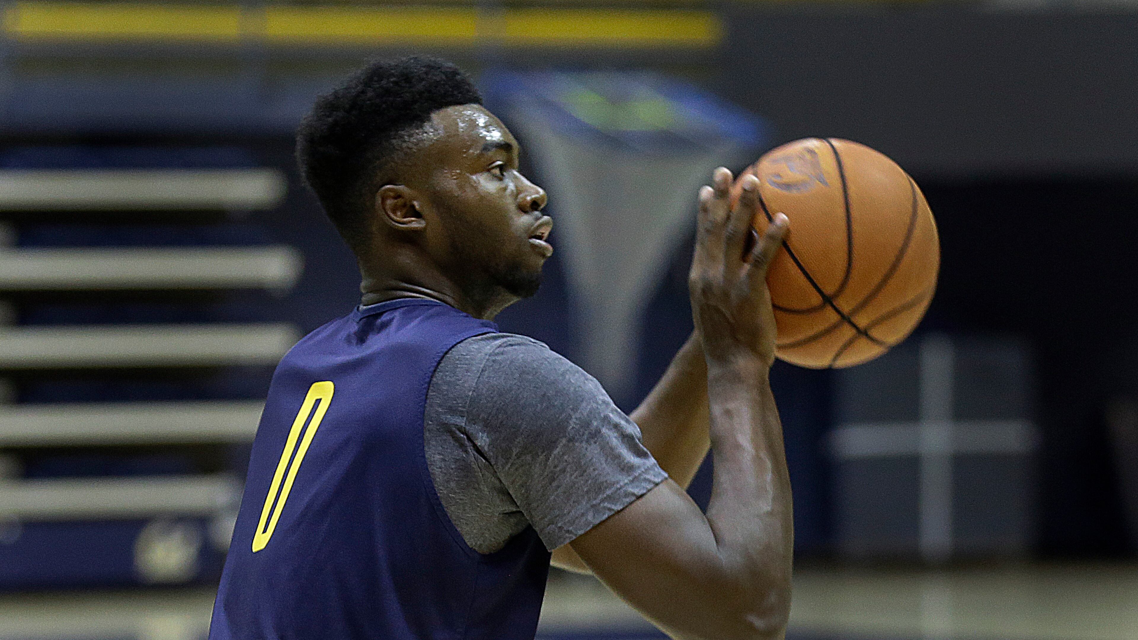 FILE - In this Oct. 7, 2015, file photo, California's Jaylen Brown shoots during basketball practice in Berkeley, Calif. Brown is expected to be one of the top freshmen in the country this season.. (AP Photo/Ben Margot, File)