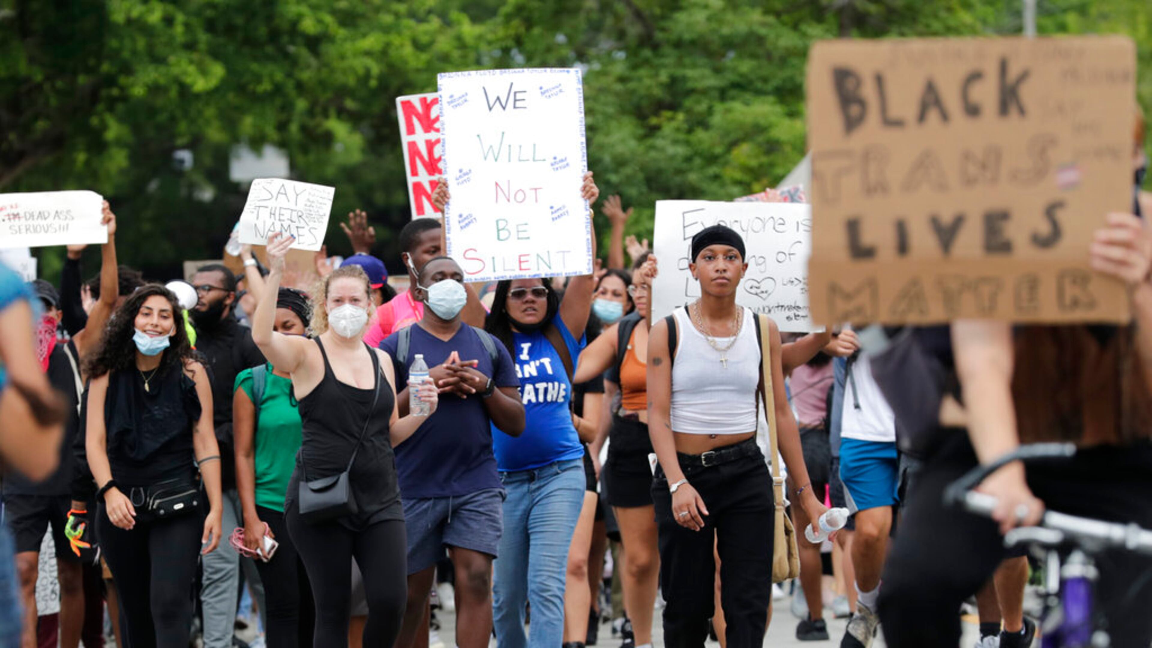 Protesters march through the streets over the death of George Floyd, Tuesday, June 2, 2020, in Miami. Protests were held throughout the country over the death of Floyd, a black man who died after being restrained by Minneapolis police officers on May 25. (AP Photo/Lynne Sladky)