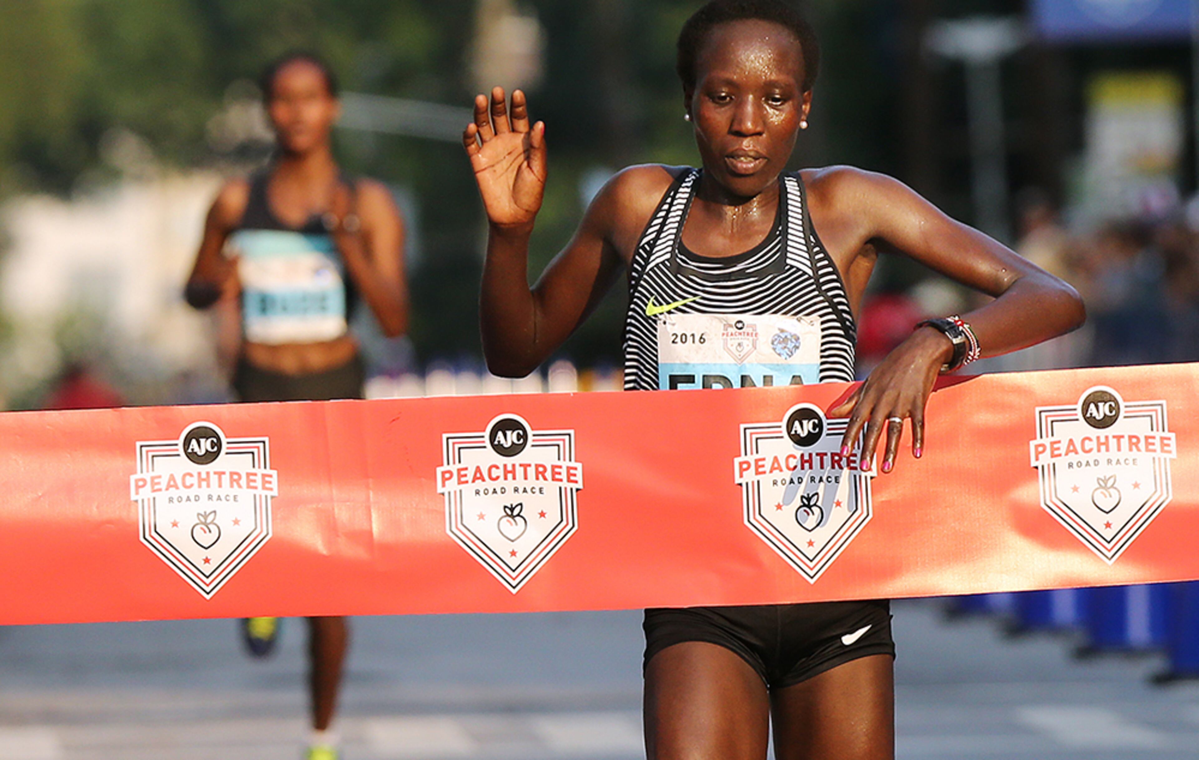 Edna Kiplagat is the first female finisher in the 47th running of the AJC Peachtree Road Race at Piedmont Park on Monday, July 4, 2016, in Atlanta.