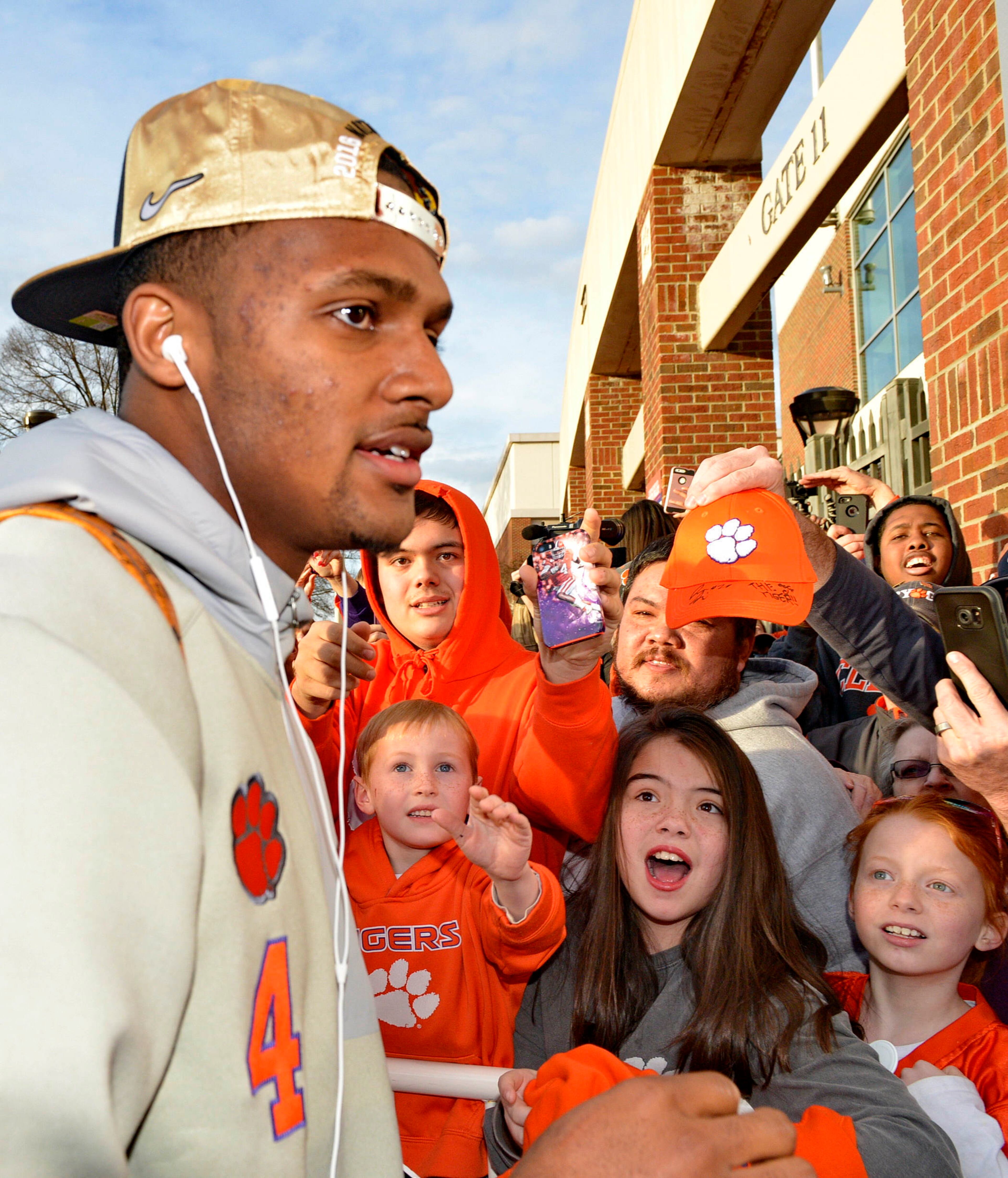 Young fans react as Clemson's Deshaun Watson returns, Tuesday, Jan. 10, 2017, in Clemson, S.C., the day after the Tigers defeated Alabama 35-31 in the College Football Playoff championship NCAA college football game in Tampa, Fla. (AP Photo/Richard Shiro)