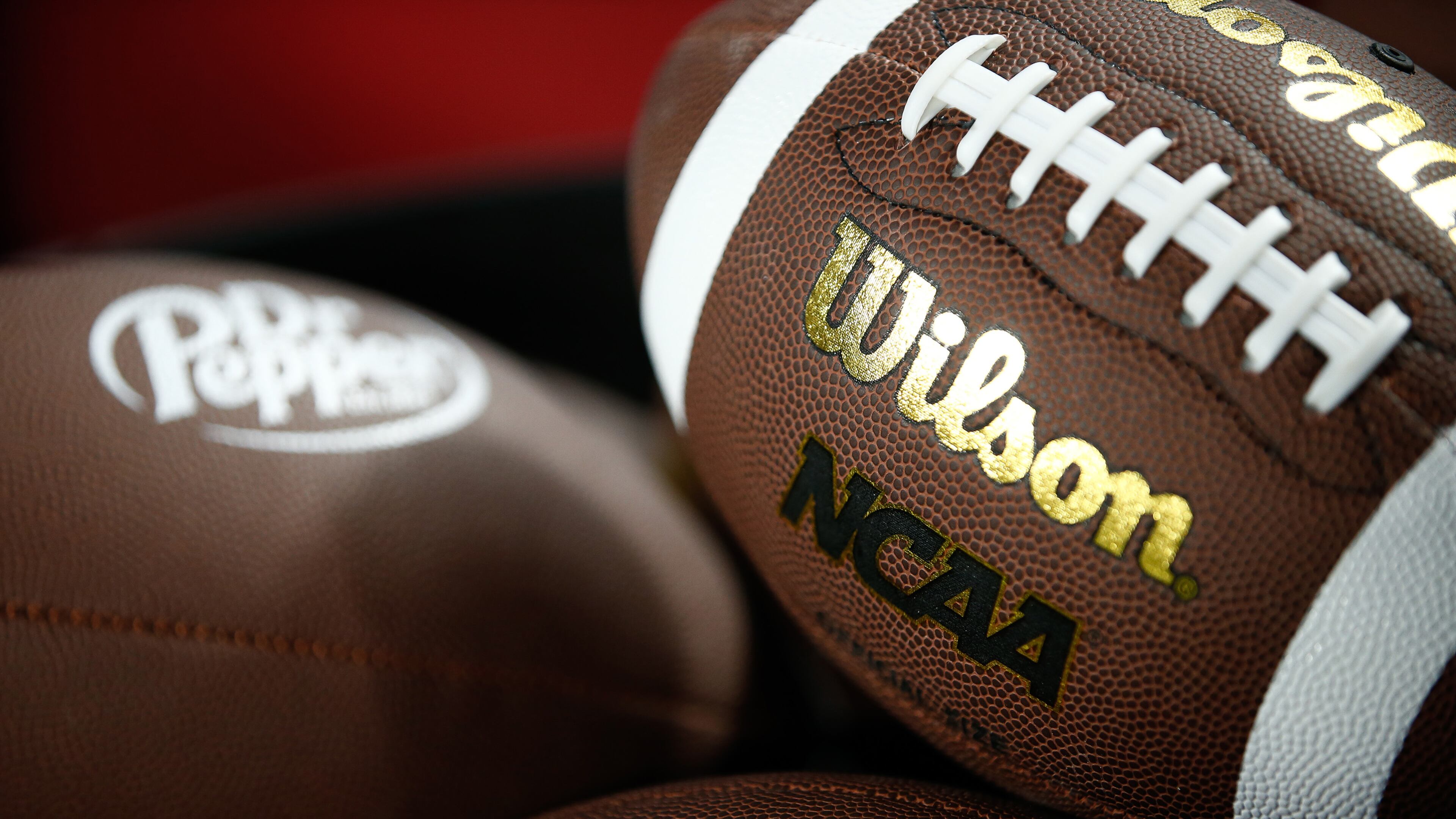 The Wilson and NCAA Logo is shown on a football as the Louisville Cardinals take on the Florida State Seminoles during the ACC Championship at Bank of America Stadium on Dec. 2, 2023, in Charlotte, North Carolina. (Isaiah Vazquez/Getty Images/TNS)