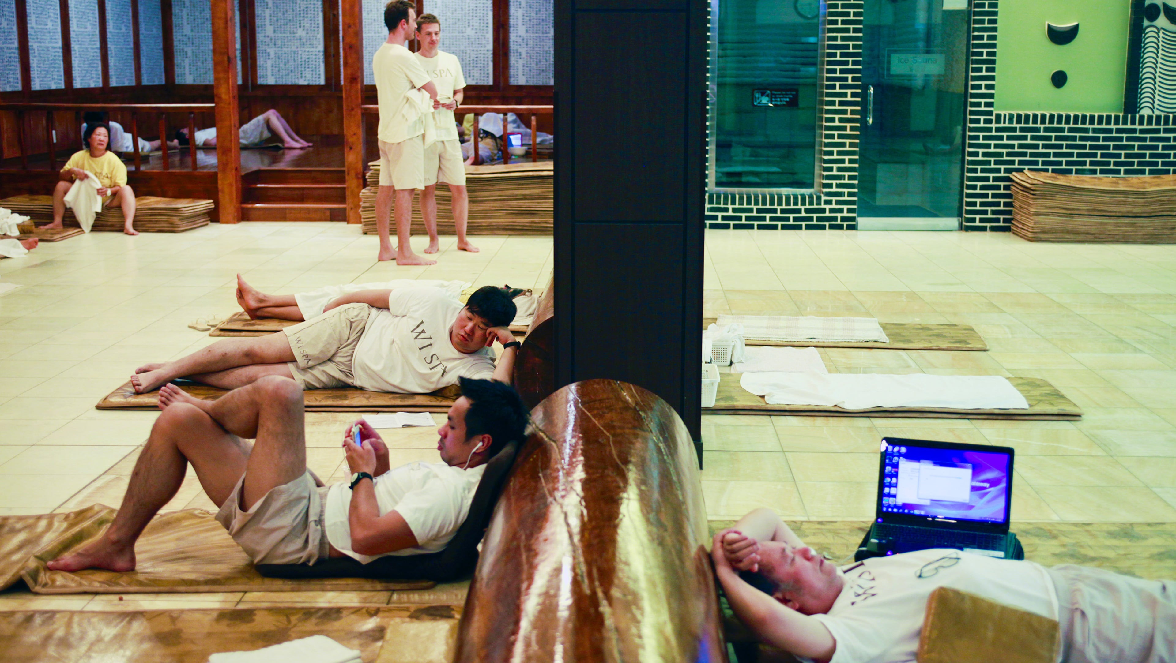 The Korean spa Wi Spa, seen here on December 11, 2012, is a family affair for immigrants and children of immigrants, who spend the night together on mats after bathing, playing video games, eating and otherwise relaxing. (Bethany Mollenkof/Los Angeles Times/TNS)