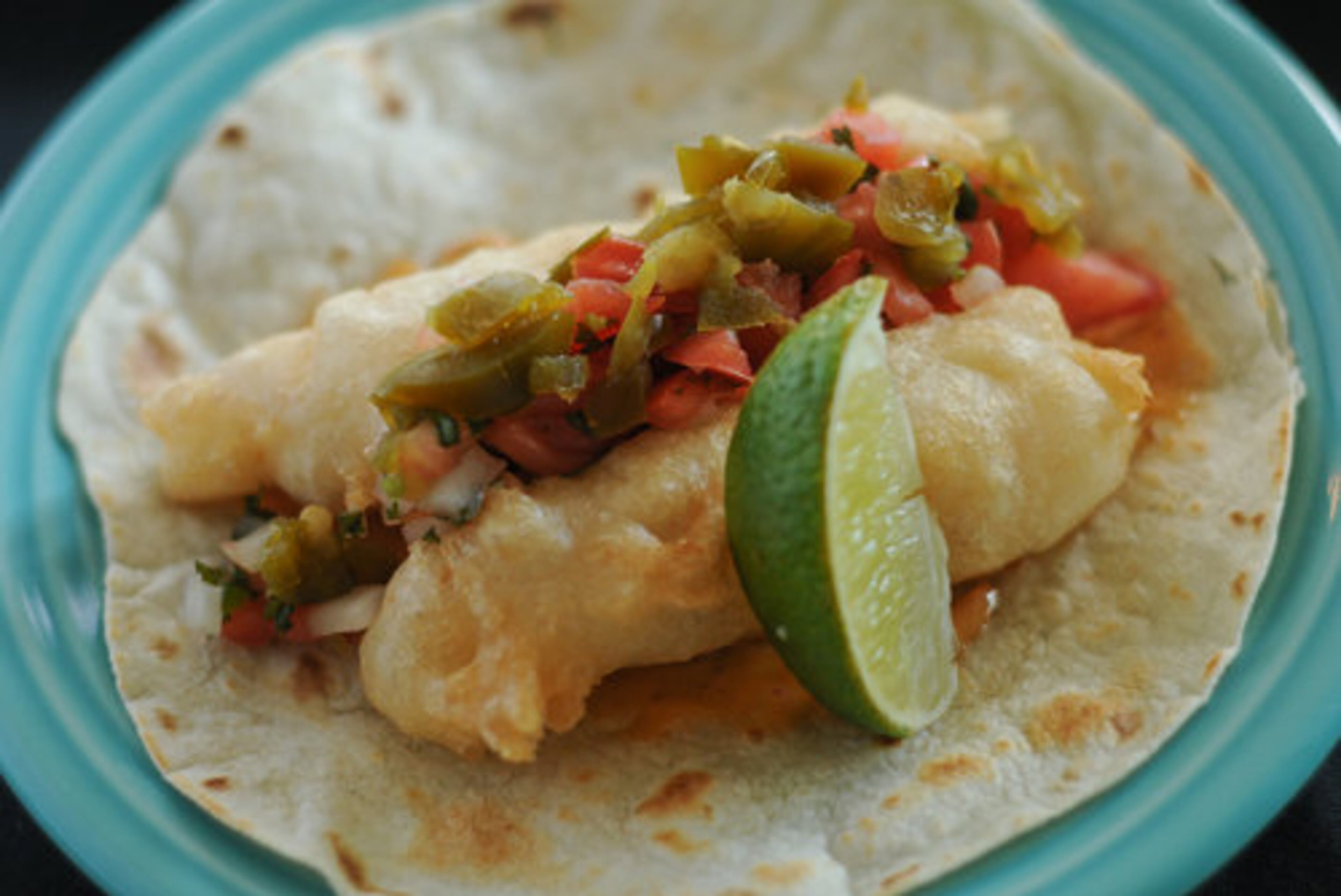 The fried shrimp taco with pickled Jalapeno from Escorpion in Atlanta. It's a restaurant, John Kessler writes, that's "taking its good time growing up." One star.
