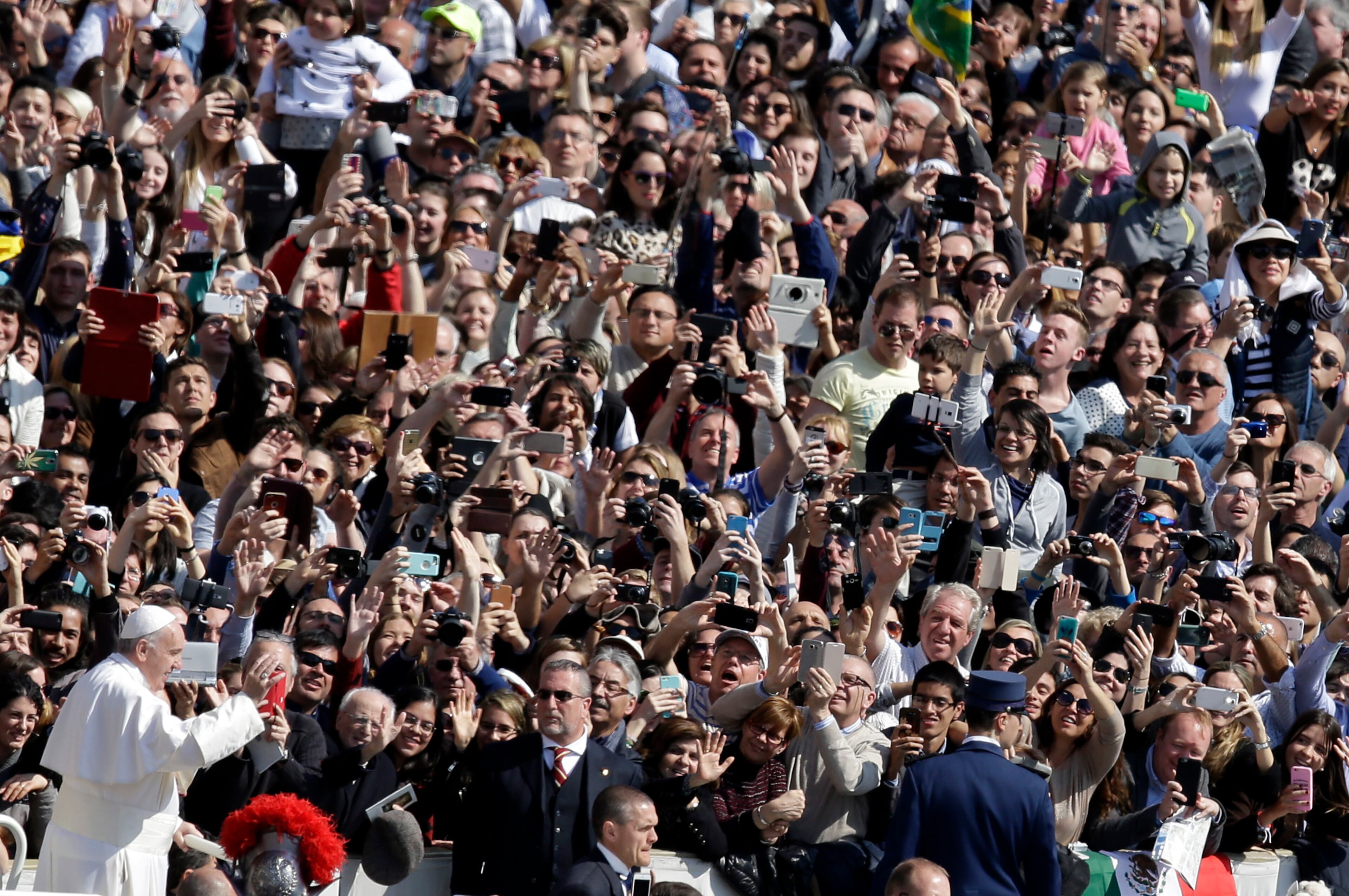 Pope Francis leaves at the end of the Easter Mass, in St. Peter's Square, at the Vatican, on March 27, 2016.