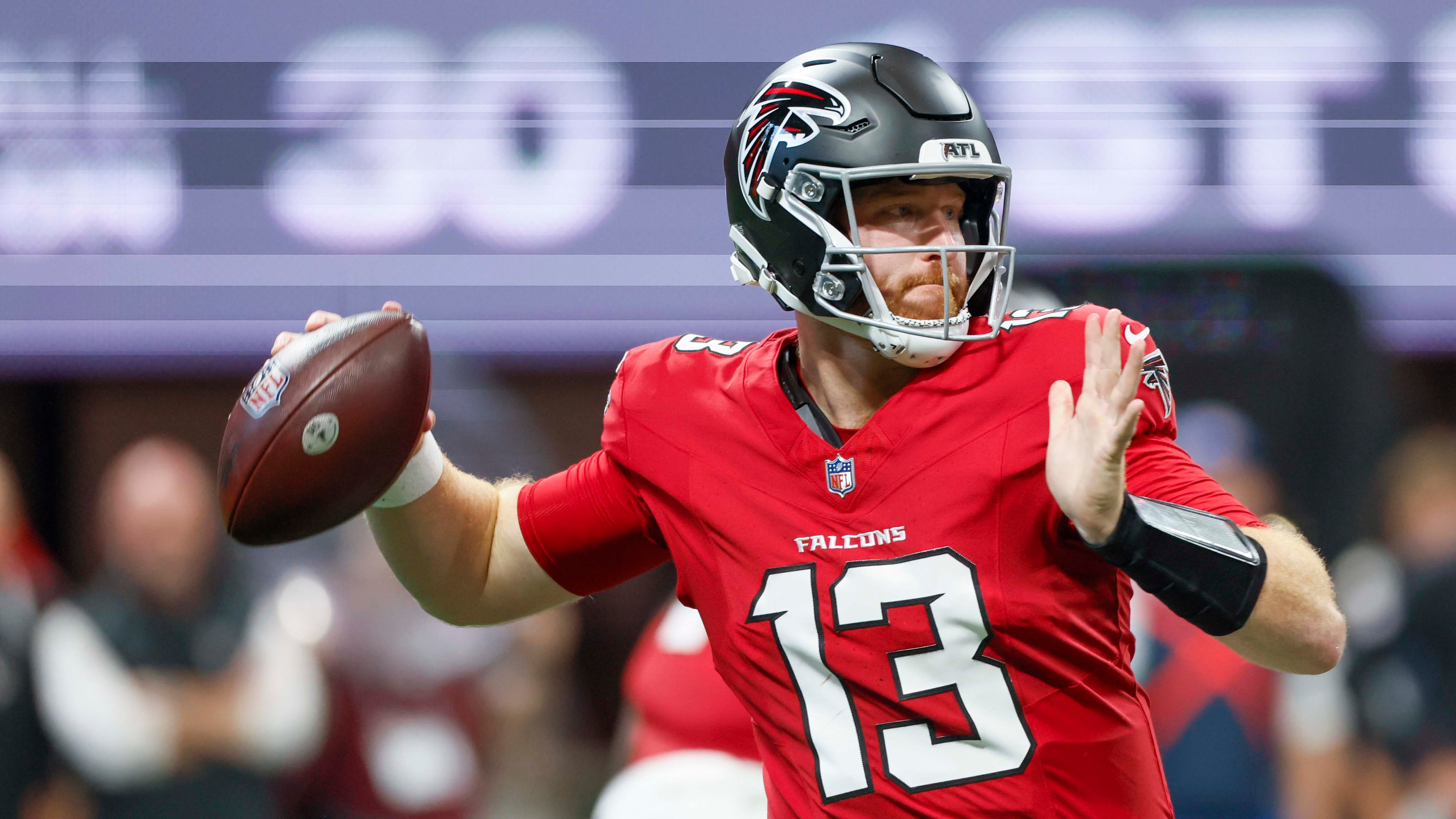 Falcons quarterback Cooper Rush attempts a pass in the first half Sunday, Sept. 20, 2026, against the Panthers at Mercedes-Benz Stadium in Atlanta. Rush went 10-for-17 passing for 86 yards, no touchdowns, two interceptions and a lost fumble. (Miguel Martinez/AJC)