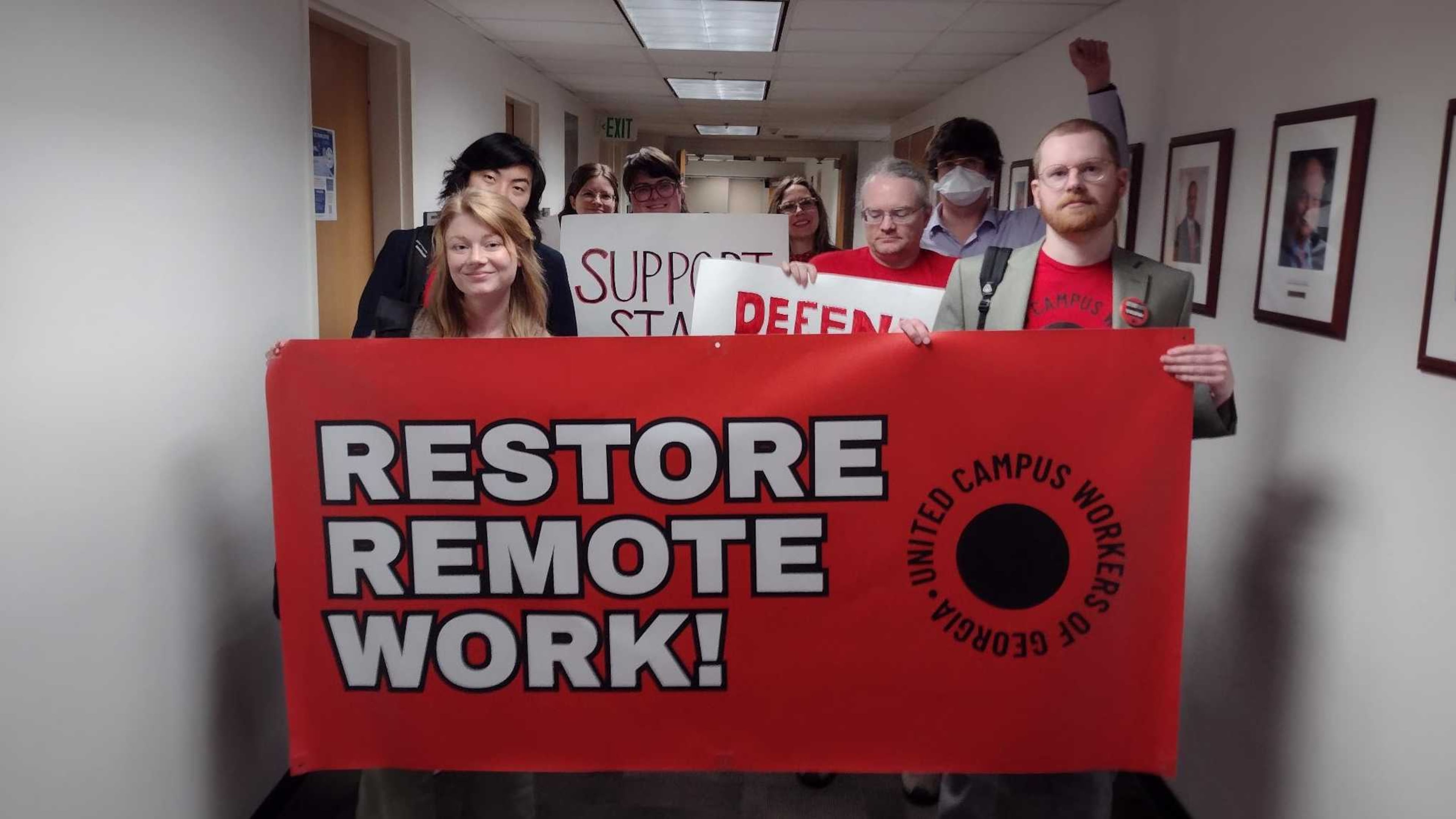 David Zackrone Hyde (far right) and other members of the United Campus Workers of Georgia conduct a walkout during a Georgia Board of Regents meeting in February. (Courtesy)