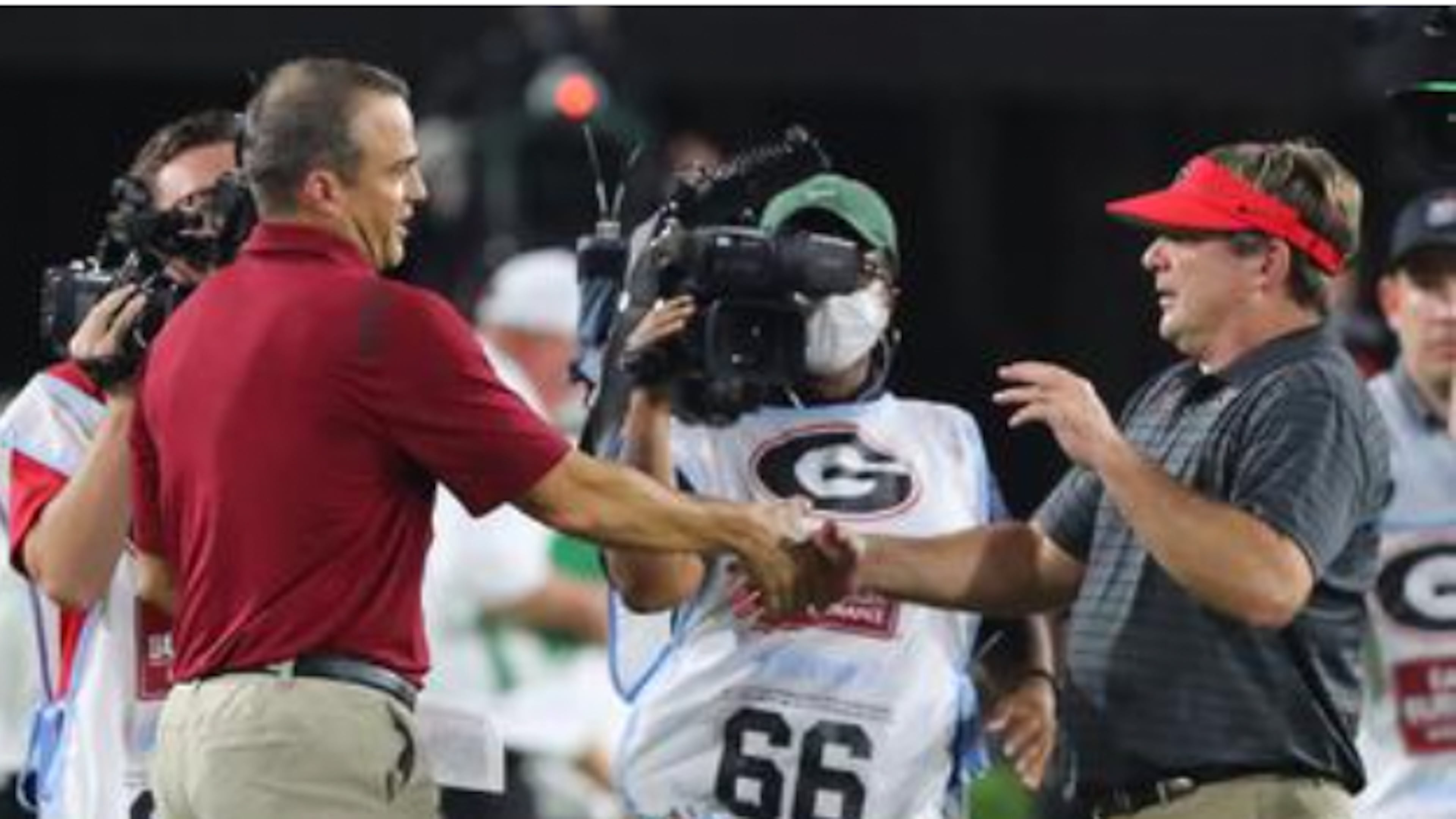 "I know it’ll be a big, big, big challenge for us," South Carolina coach Shane Beamer (left) says of facing Kirby Smart in November. (Curtis Compton/AJC 2022)