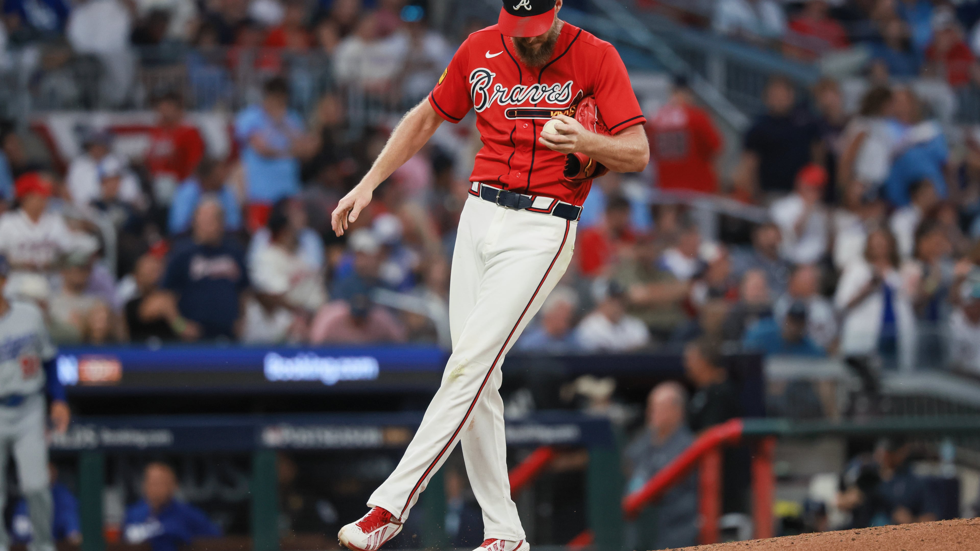 Atlanta Braves pitcher Chris Sale reacts after giving up a two-run home run to Los Angeles Dodgers third baseman Enrique Hernández during the fourth inning of Game 3 of the MLB National League Division Series between the Atlanta Braves and the Los Angeles Dodgers, Tuesday, Oct. 6, 2026, in Atlanta. (Jason Getz/AJC)