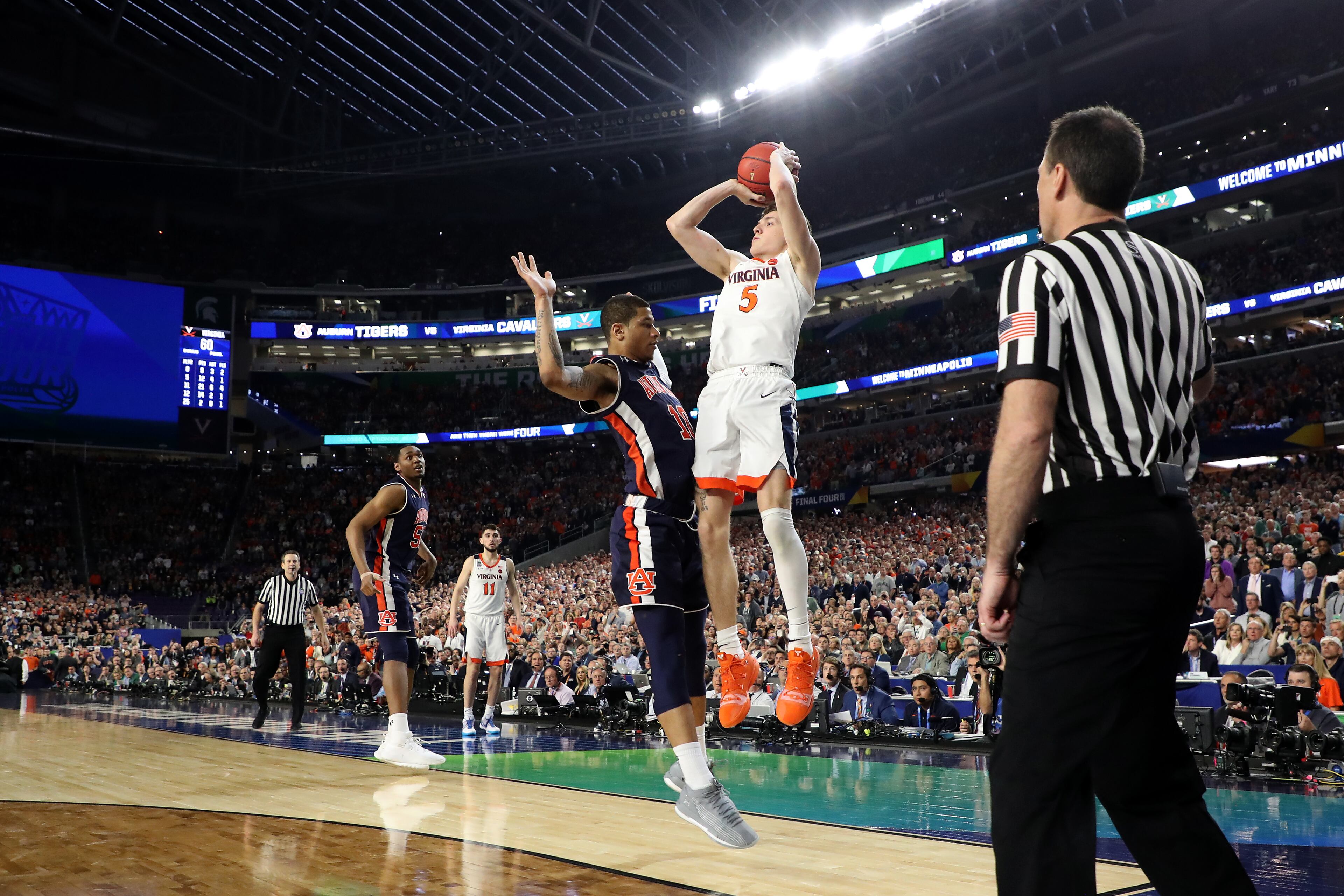 With his team down by two points, Kyle Guy of Virginia attempted a three-pointer as time expired. A foul was called on Auburn's Samir Doughty. Guy made all three free throws and the Cavs advanced to the national championship game. (Photo by Streeter Lecka/Getty Images)