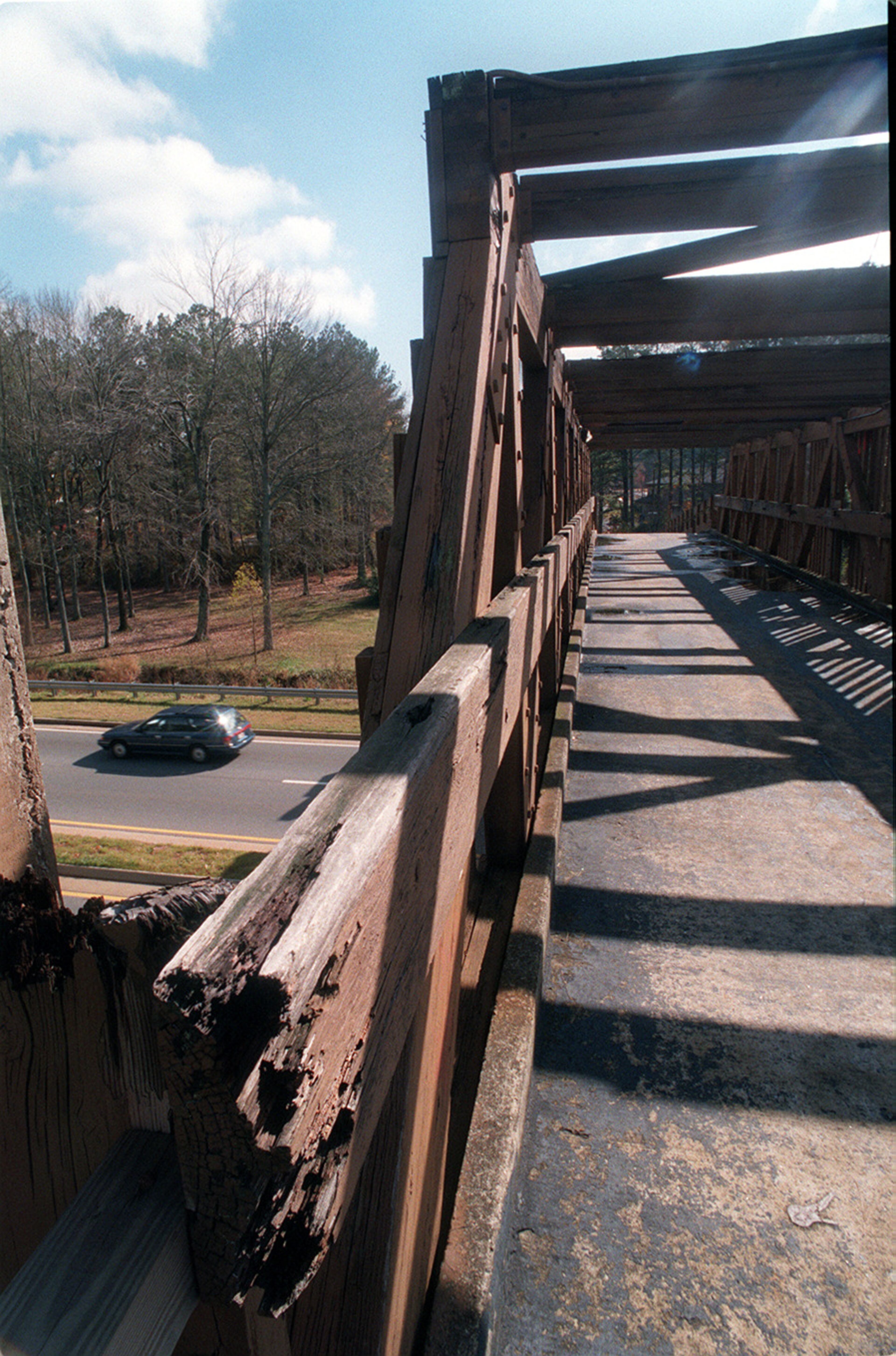 The golf cart bridge that crosses over Ga. 54 in Peachtree City was in serious need of repair in 1995.
