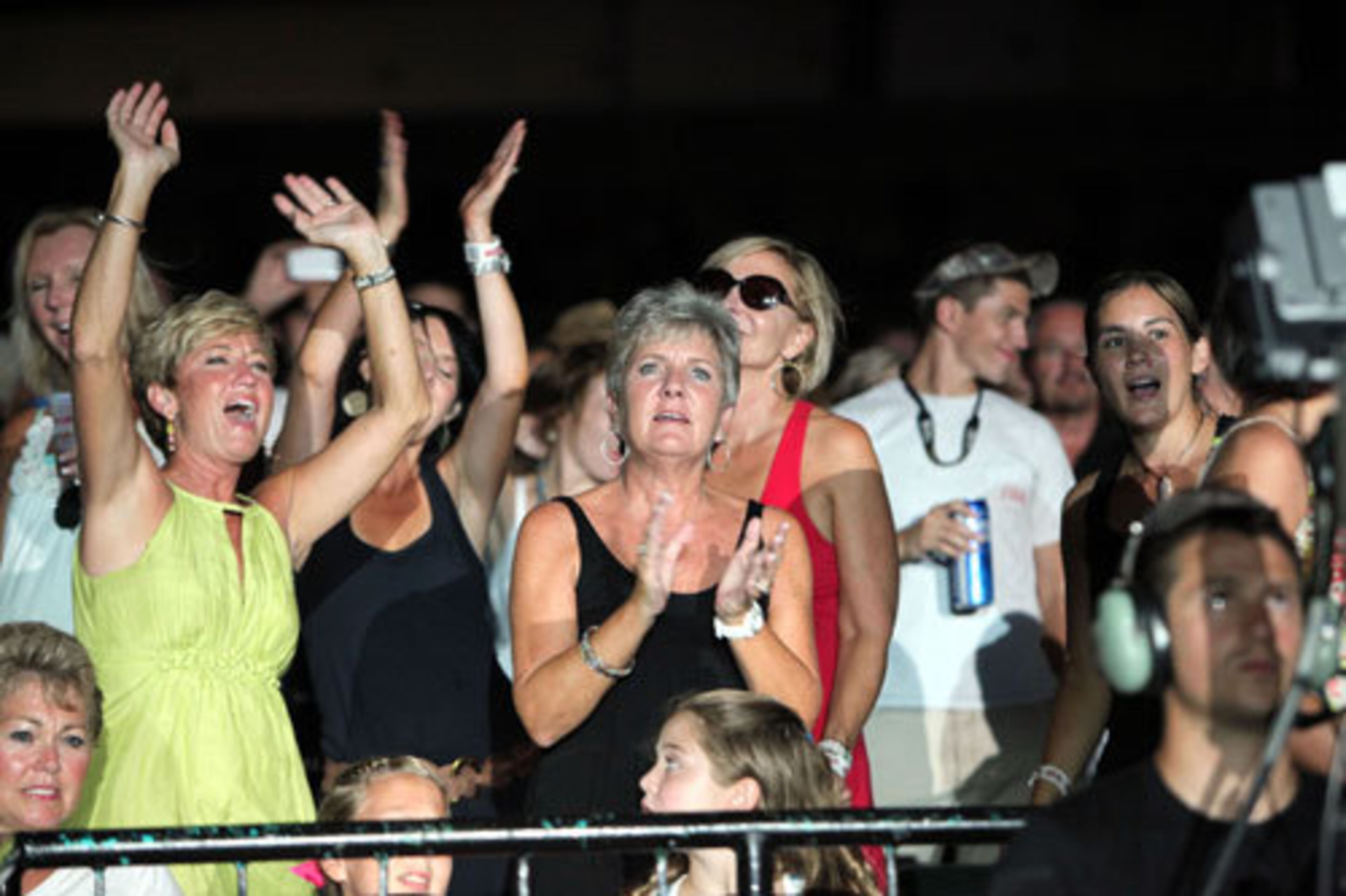 Fans cheer at the nearly sold-out Aaron's Amphitheatre show.