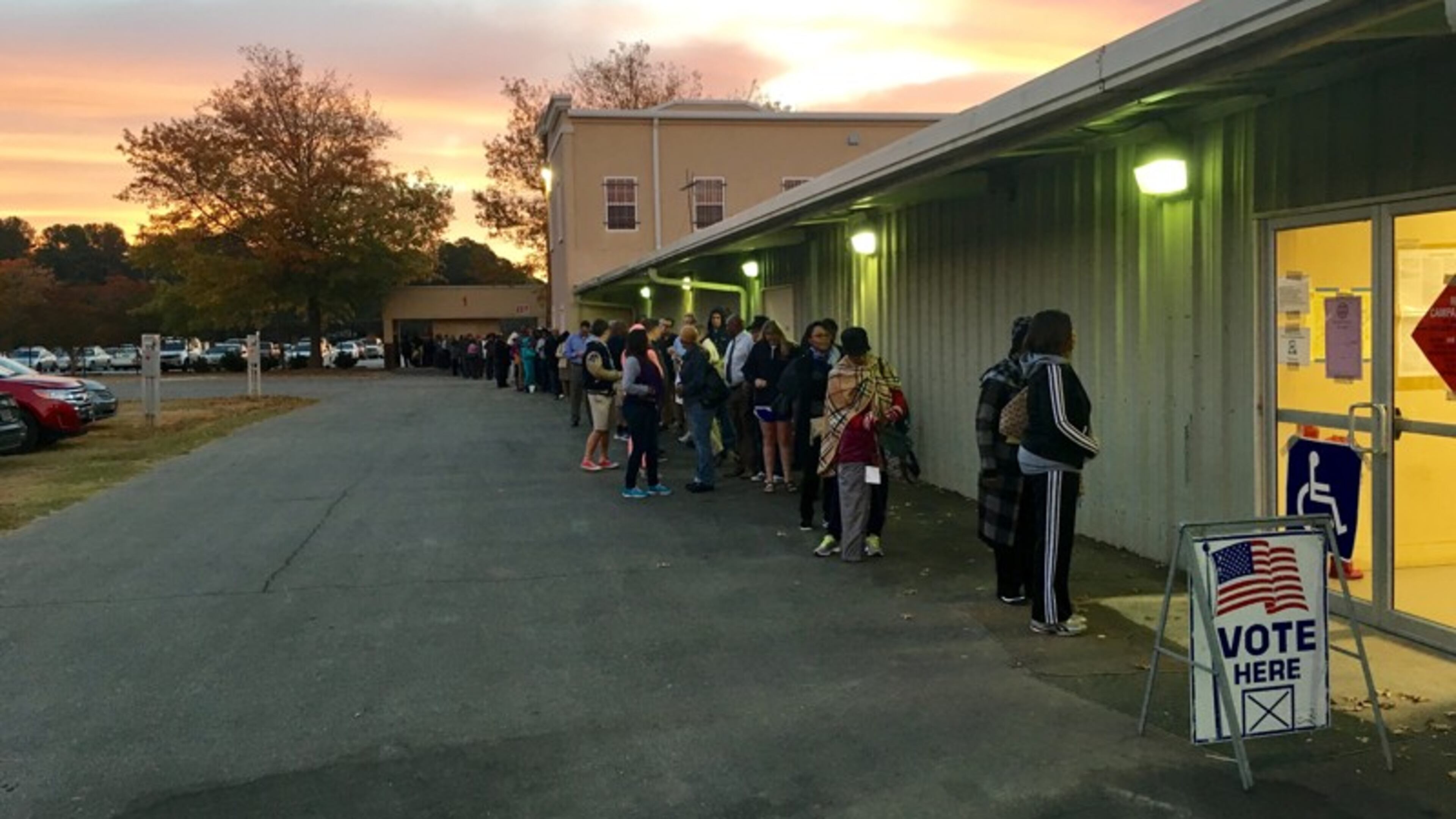 More than 100 people were lined up to vote at the Gwinnett County Fairgrounds in Lawrenceville before polls opened at 7 a.m. Tuesday.