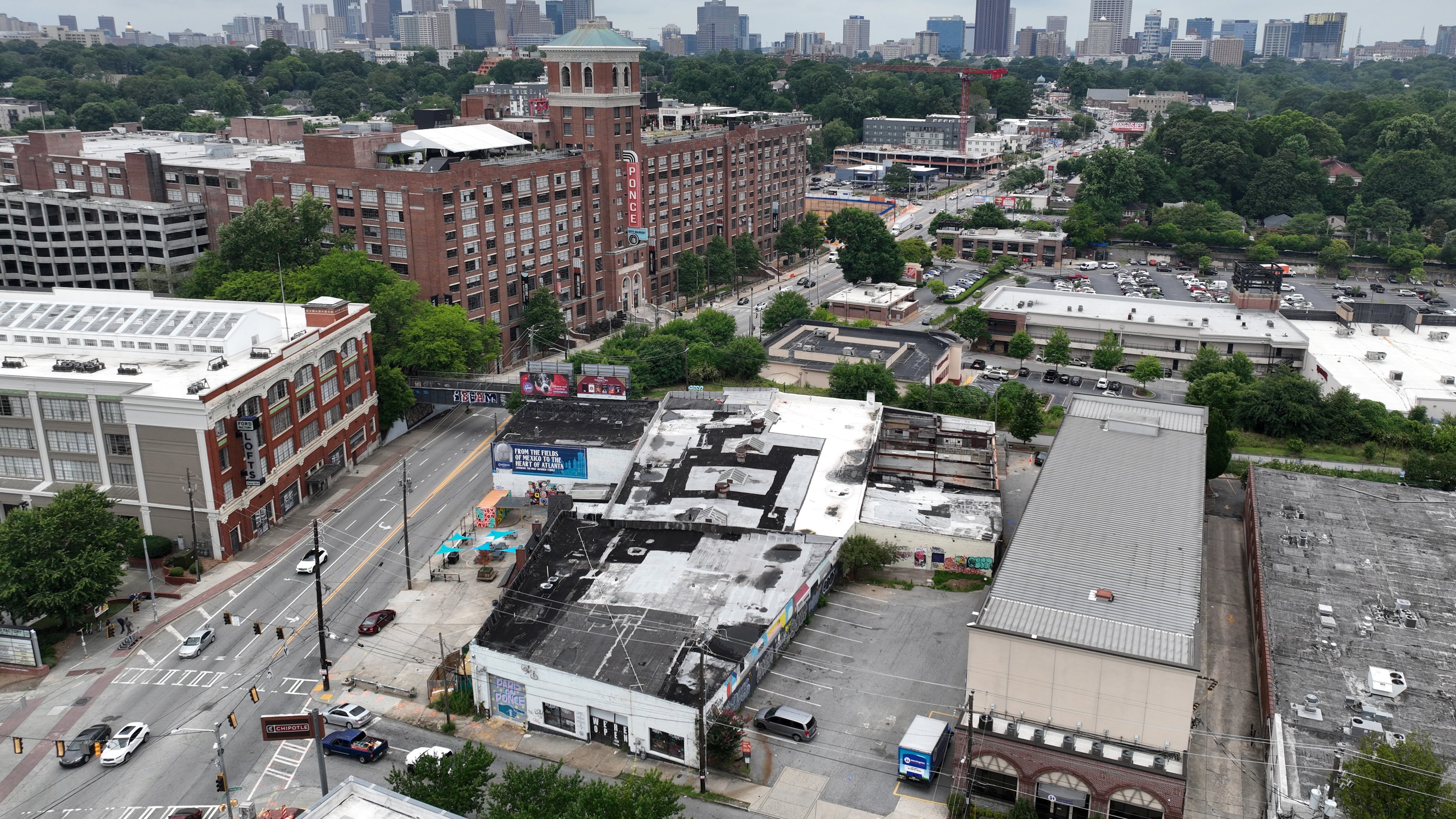 An aerial photograph shows a piece of Beltline-adjacent building (lower right), where 8ARM and former Paris on Ponce are located, on Ponce de Leon in Atlanta on Tuesday, June 28, 2022. (Hyosub Shin / Hyosub.Shin@ajc.com)