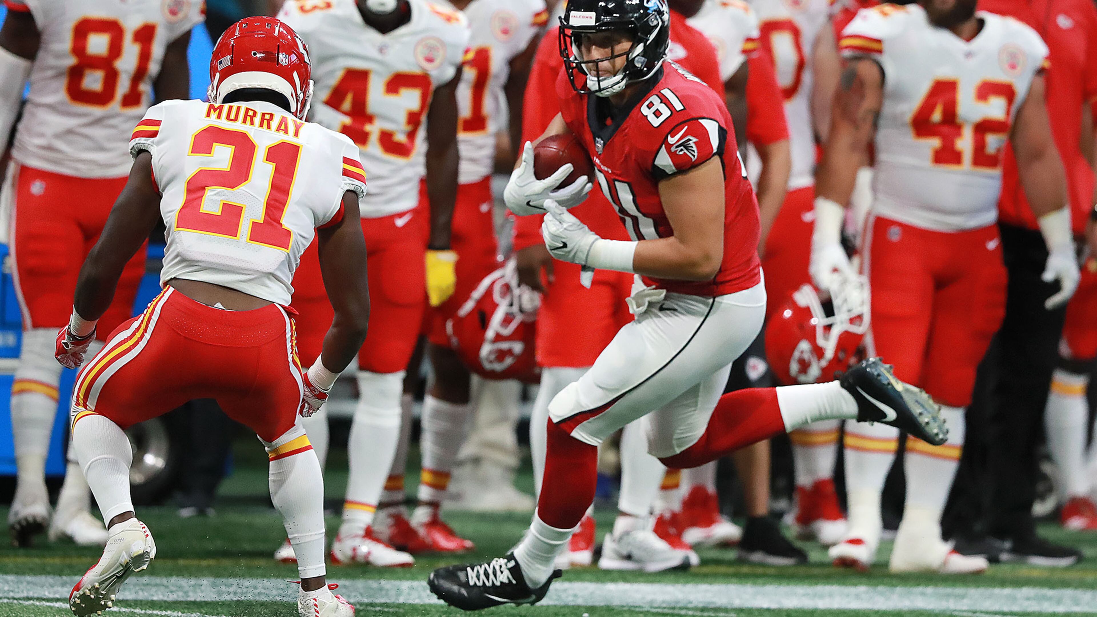 Falcons tight end Austin Hooper makes a big first down gain against the Chiefs during the first quarter Friday, Aug. 17, 2018, at Mercedes-Benz Stadium in Atlanta.