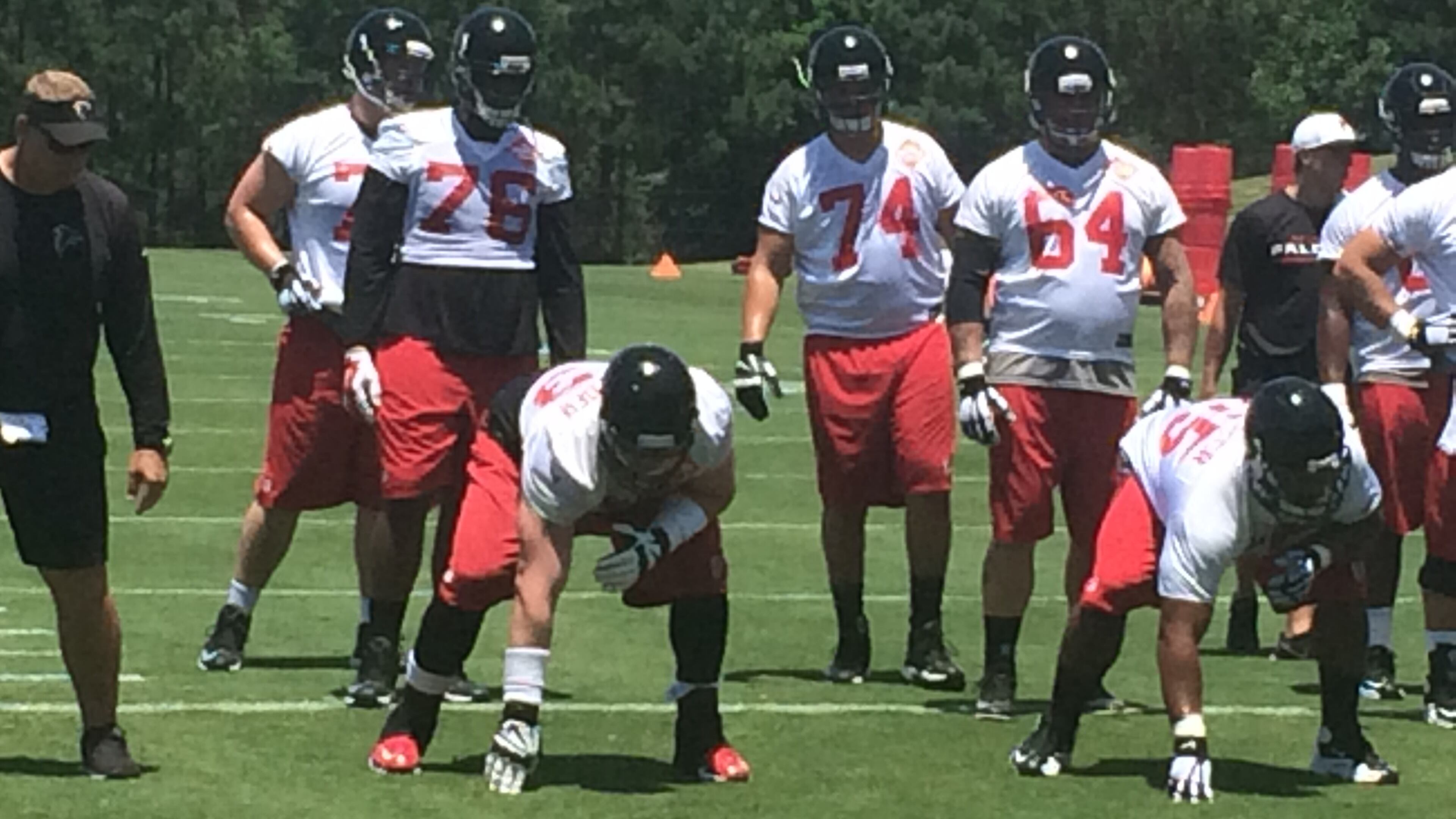 Tackle Ryan Schraeder and guard Chris Chester ready to fire off the ball. (D. Orlando Ledbetter/AJC)