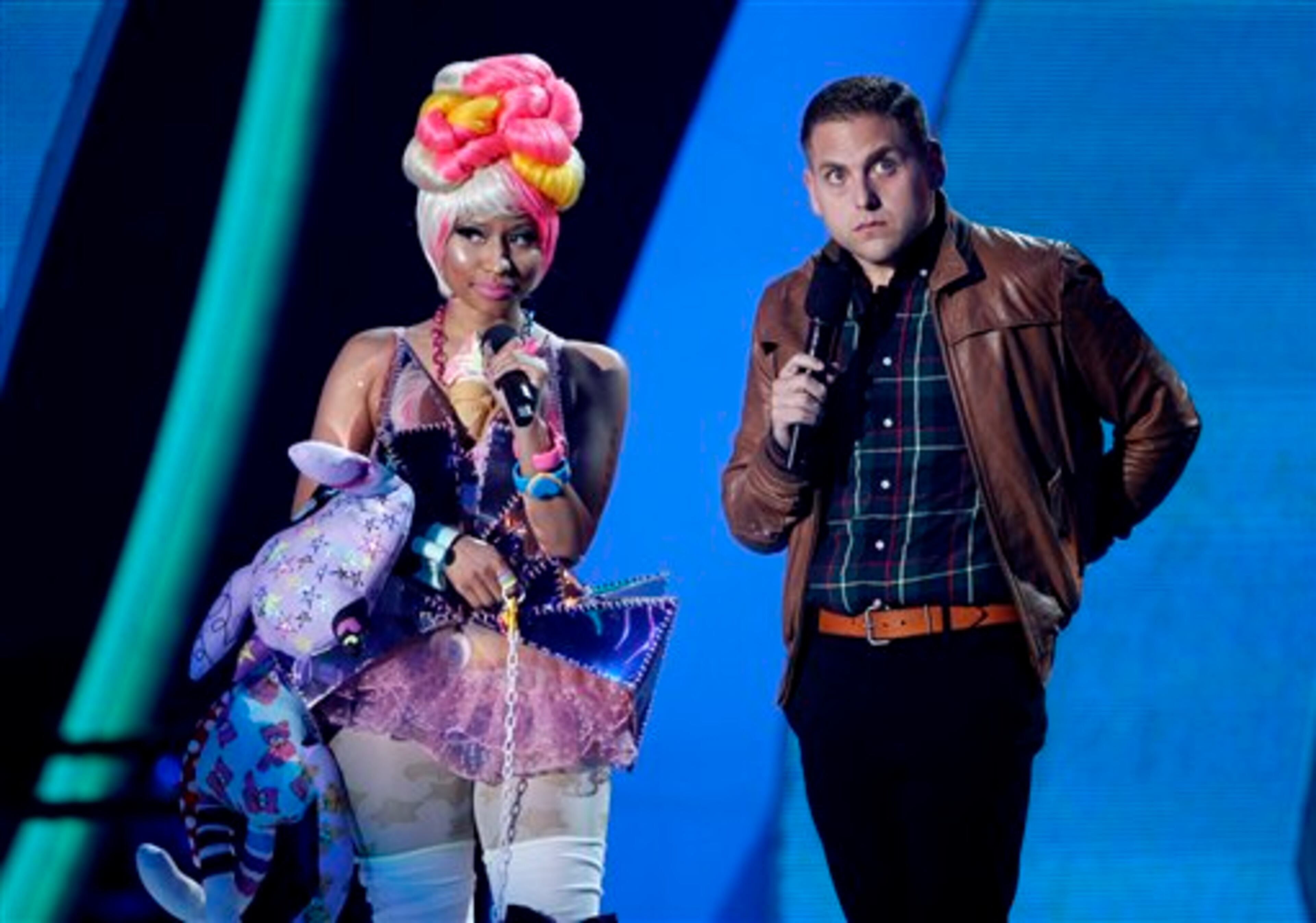 Presenters Nicki Minaj, left, and Jonah Hill present the best pop video award at the MTV Video Music Awards on Sunday Aug. 28, 2011, in Los Angeles. (AP Photo/Matt Sayles)