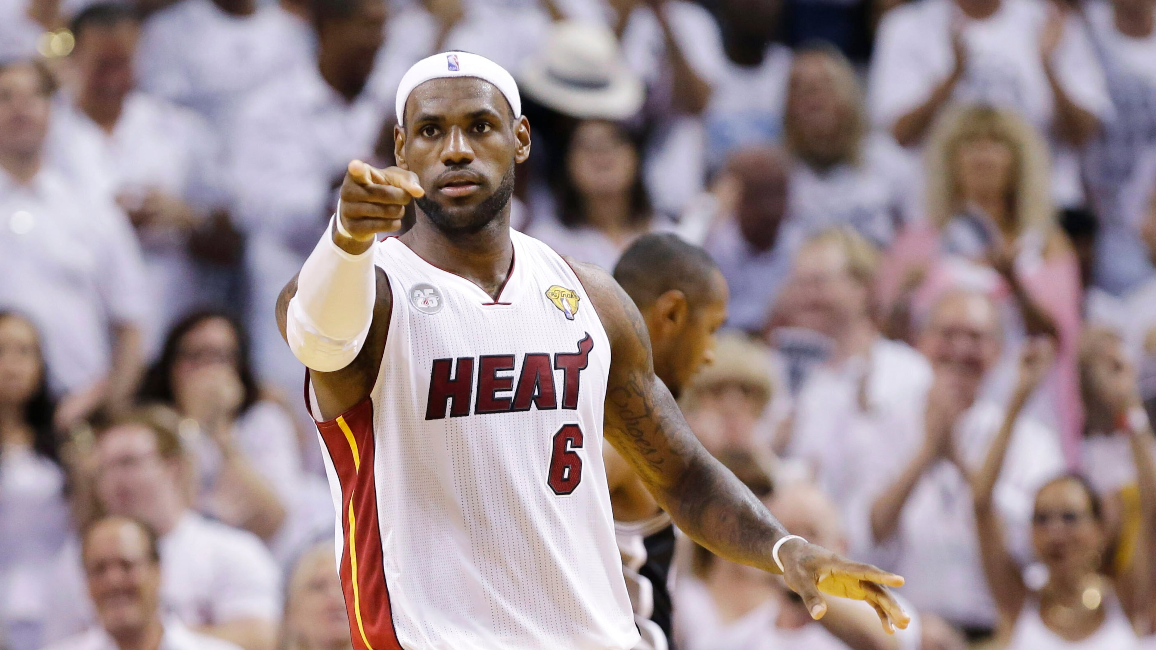 FILE - Miami Heat's LeBron James (6) gestures after a play against the San Antonio Spurs during the first half in Game 7 of the NBA basketball championships, June 20, 2013, in Miami. (AP Photo/Lynne Sladky, File)