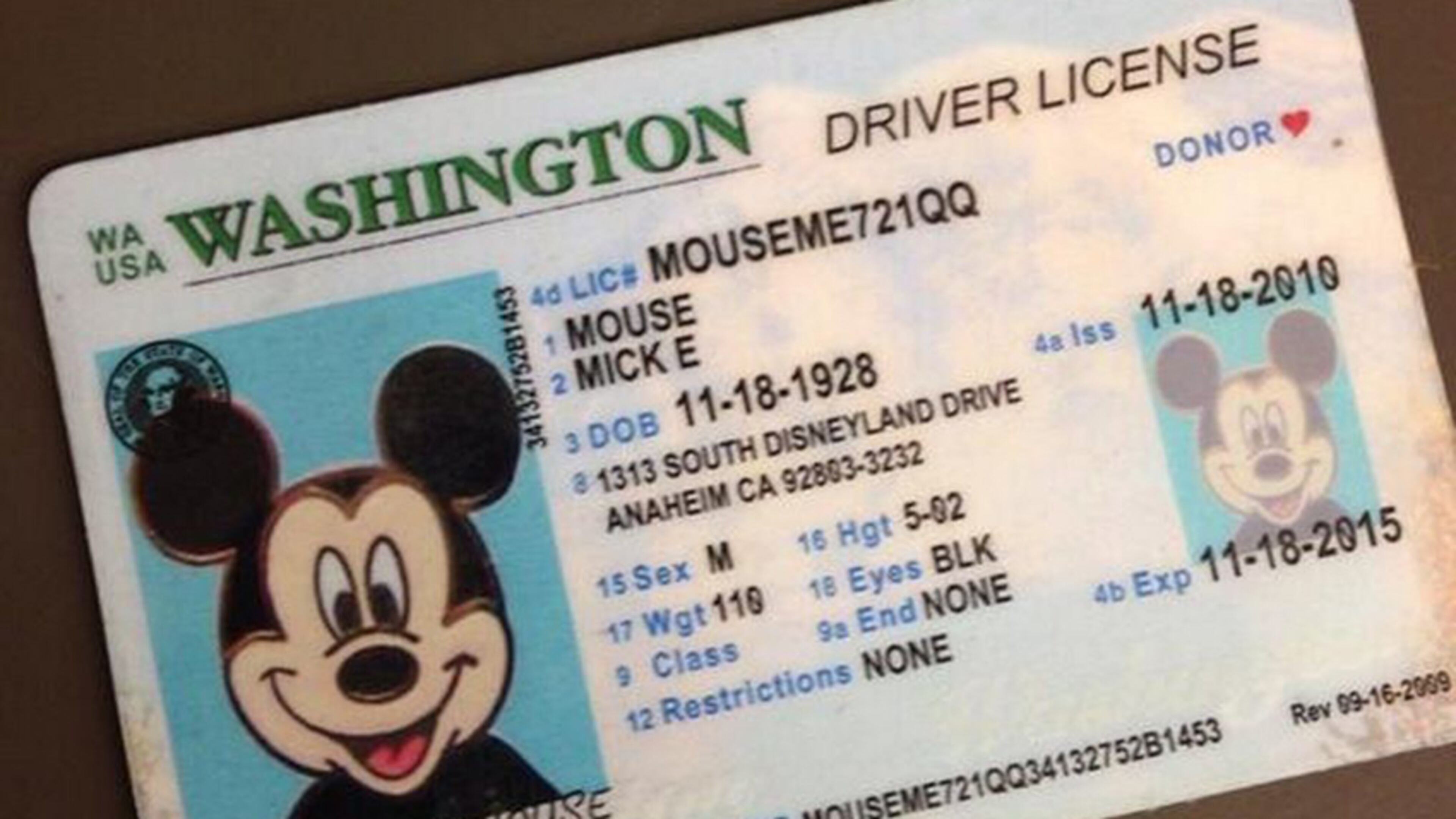Bellevue police provided this photo of a Washington State license registered to Mickey Mouse, though his address is in Anaheim, Calif.