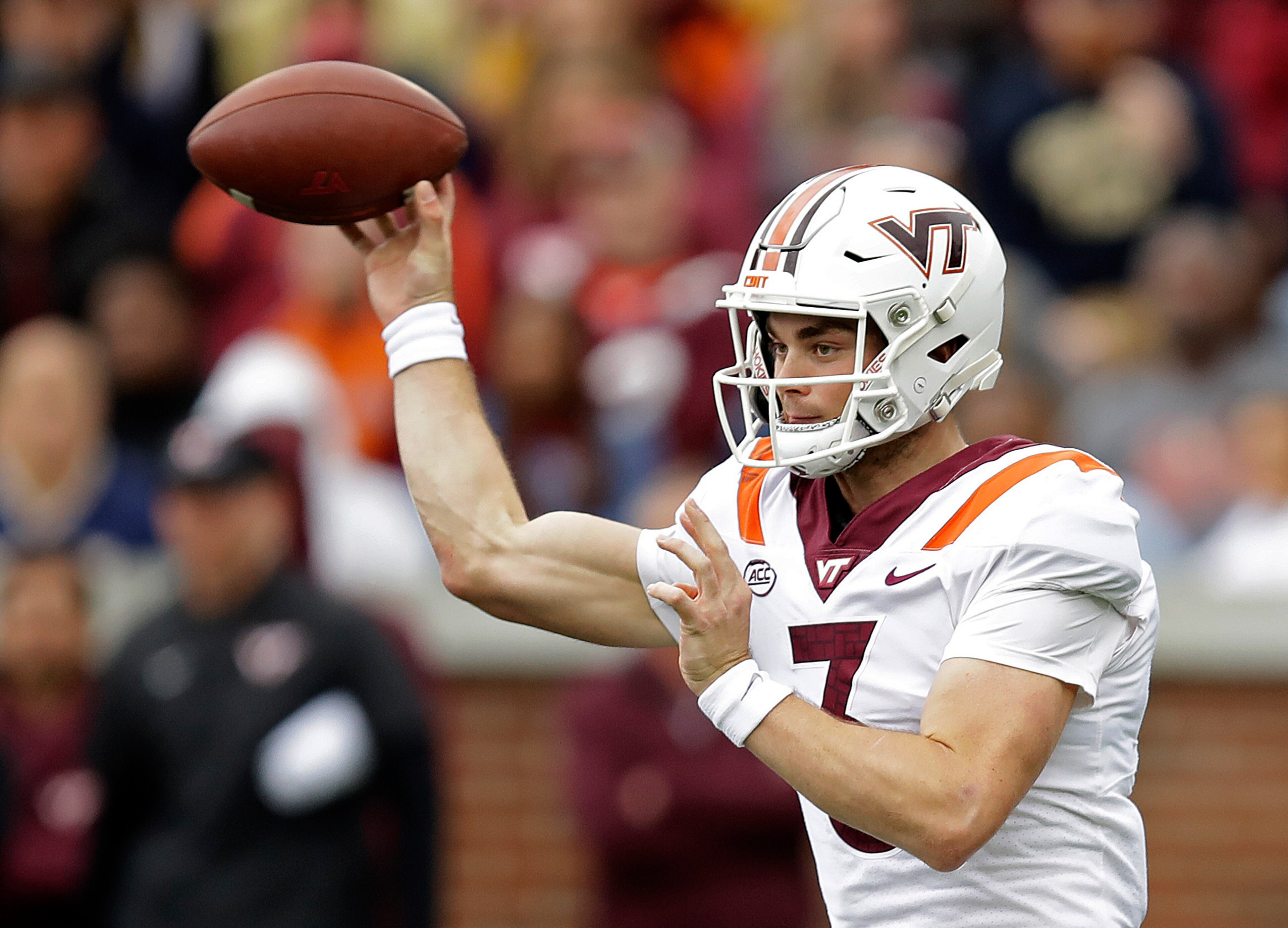 Virginia Tech quarterback Braxton Burmeister passes against Georgia Tech during the first half of an NCAA college football game Saturday, Oct. 30, 2021, in Atlanta. (AP Photo/Ben Margot)