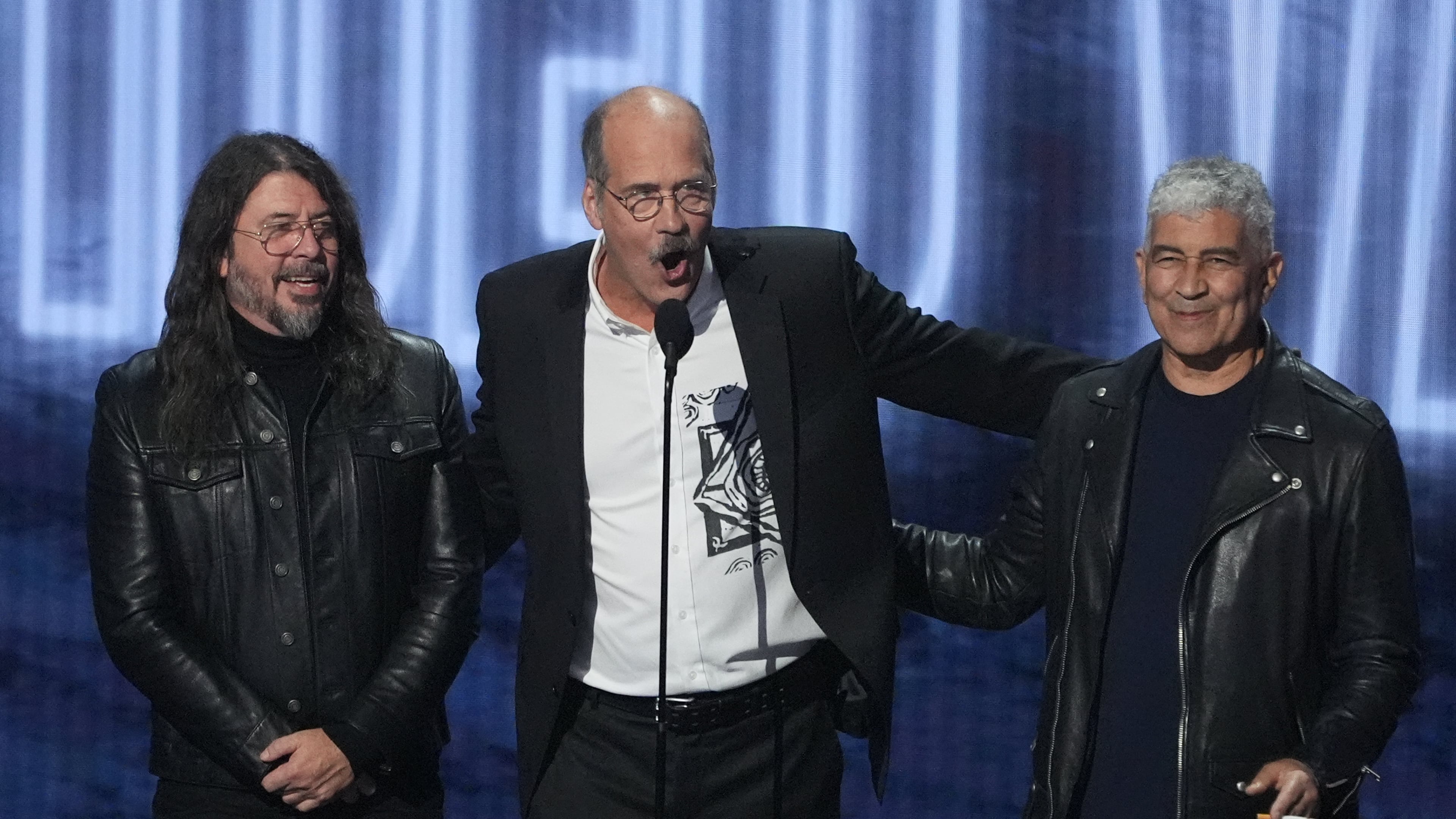 David Grohl, from left, Krist Novoselic, and Pat Smear of Nirvana accept the video vanguard award during the MTV Video Music Awards on Sunday, Sept. 27, 2026, at the Peacock Theater in Los Angeles. (AP Photo/Chris Pizzello)
