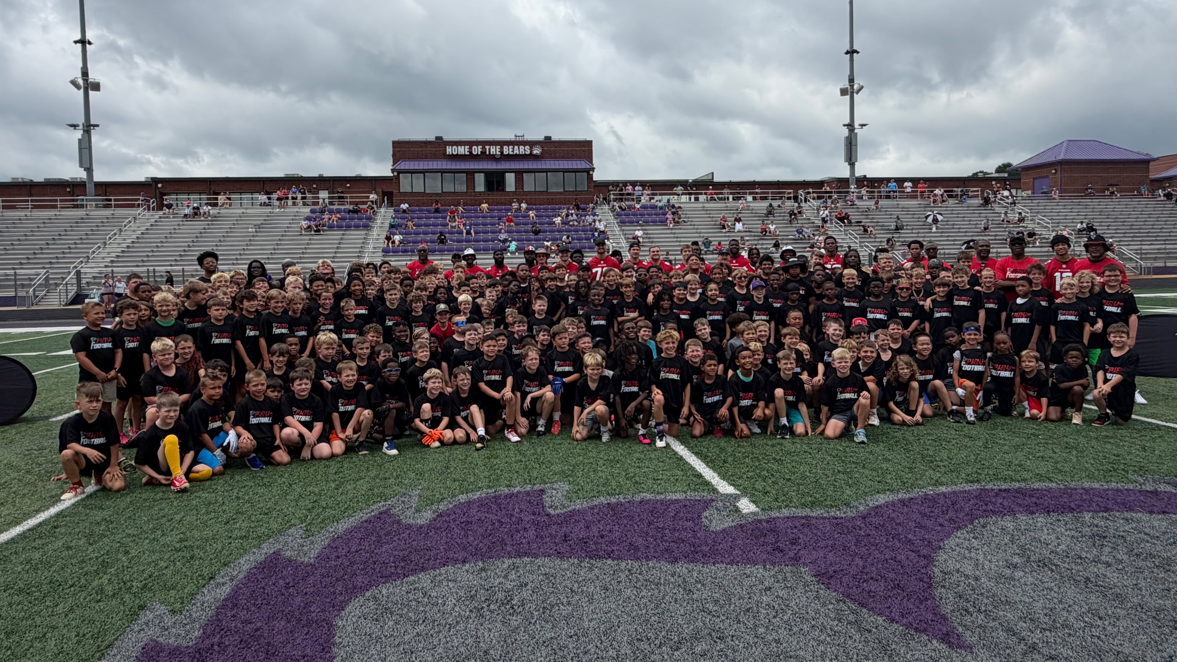 Falcons rookies take a photograph with youth camp participants at Cherokee Bluff High School in Flowery Branch on Monday, June 22, 2026. (Daniel Flick/AJC)