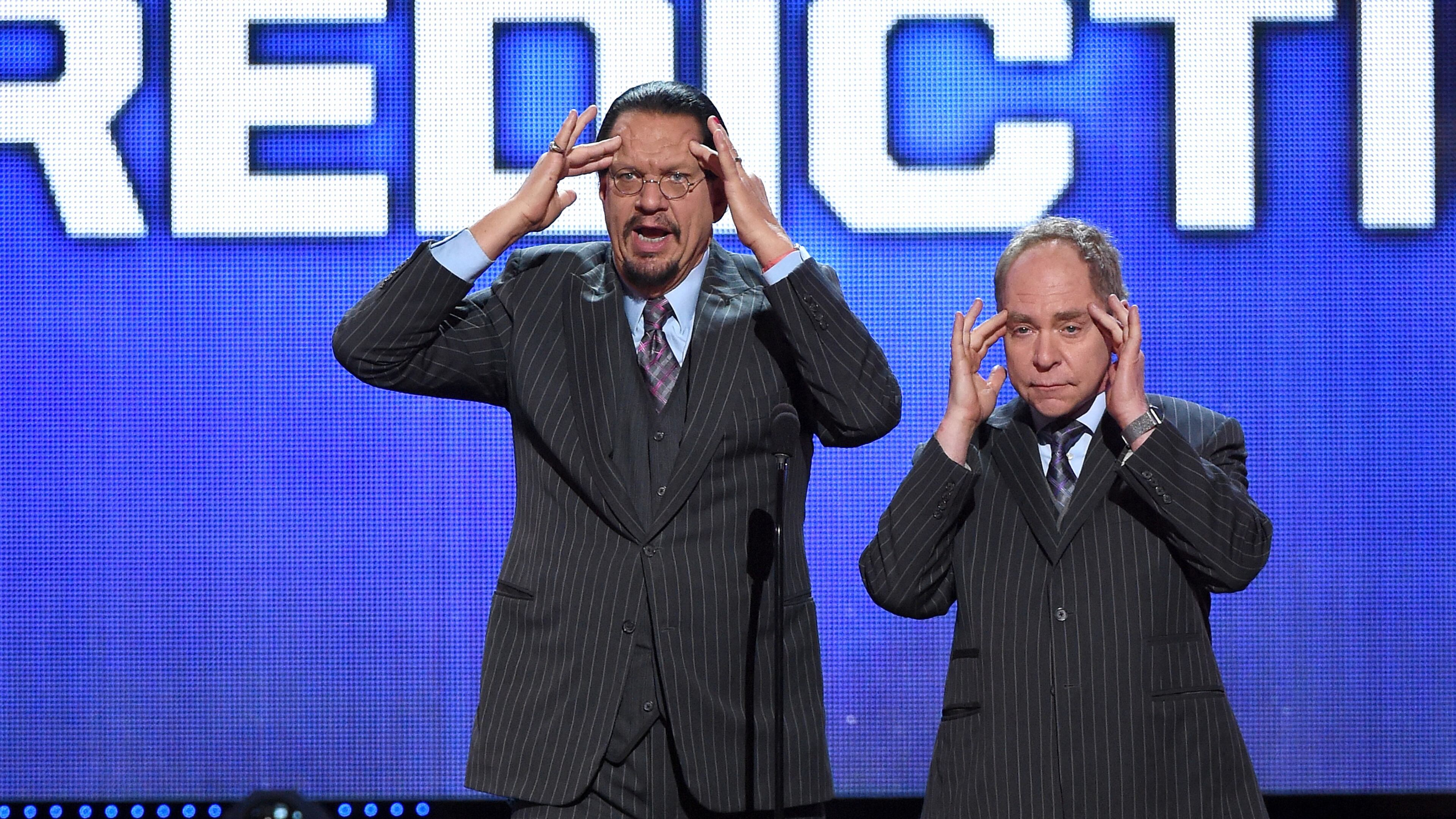LAS VEGAS, NV - JUNE 22: Penn Jillette (L) and Teller of the comedy/magic team Penn & Teller perform during the 2016 NHL Awards at The Joint inside the Hard Rock Hotel & Casino on June 22, 2016 in Las Vegas, Nevada. (Photo by Ethan Miller/Getty Images)