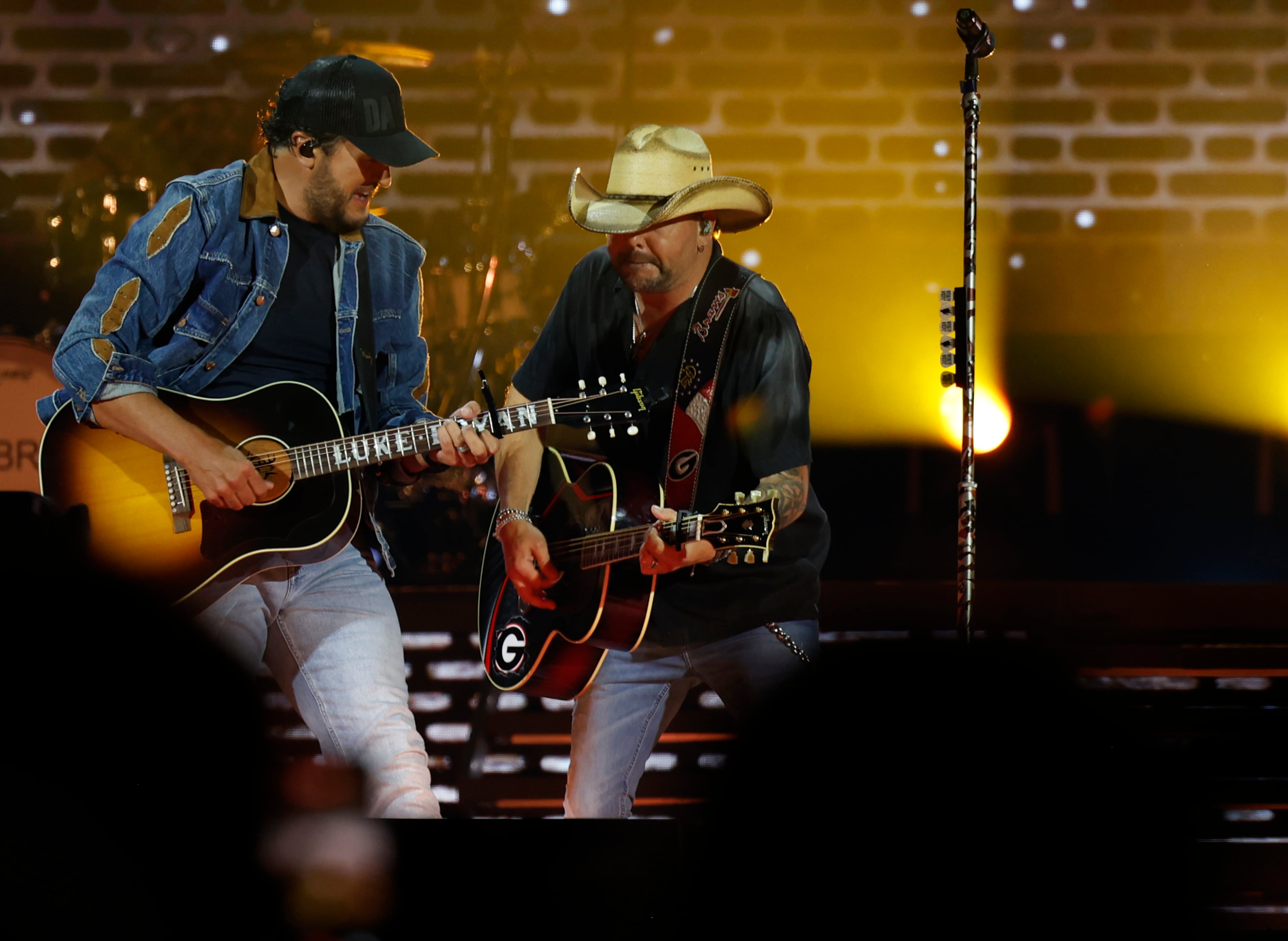 Georgia natives Jason Aldean (right) and Luke Bryan perform together for the first "Live Between the Hedges Concert Presented by PruittHealth" at Sanford Stadium, home of the University of Georgia football team, Saturday, April 25, 2026, in Athens. (Akili-Casundria Ramsess/EyeAkili Media)