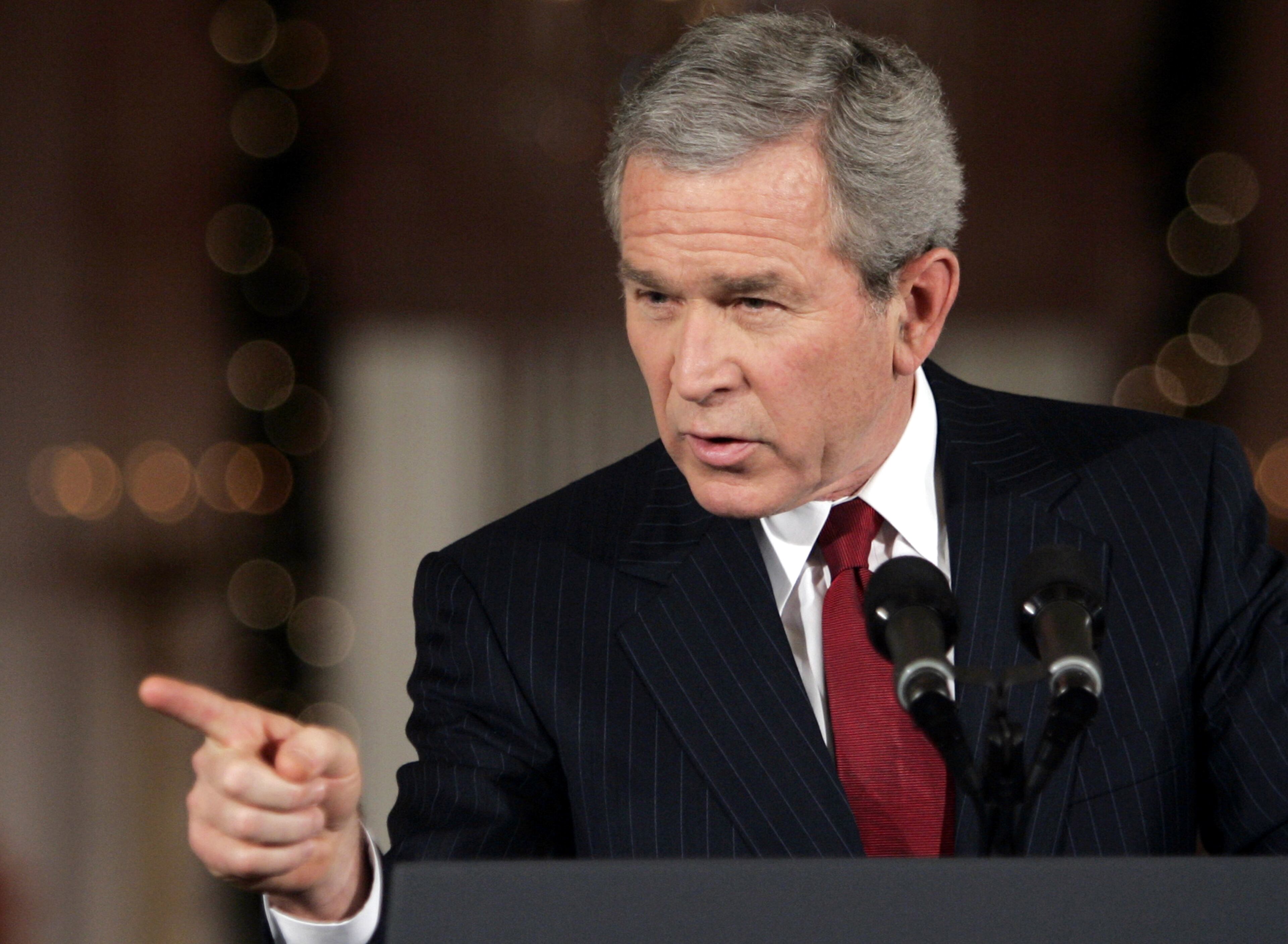 President Bush gestures during a news conference in the East Room of the White House on Monday, Dec. 19, 2005 in Washington. Brushing aside bipartisan criticism in Congress, Bush said Monday he approved spying on suspected terrorists without court orders because it was "a necessary part of my job to protect" Americans from attack. (AP Photo/Evan Vucci)