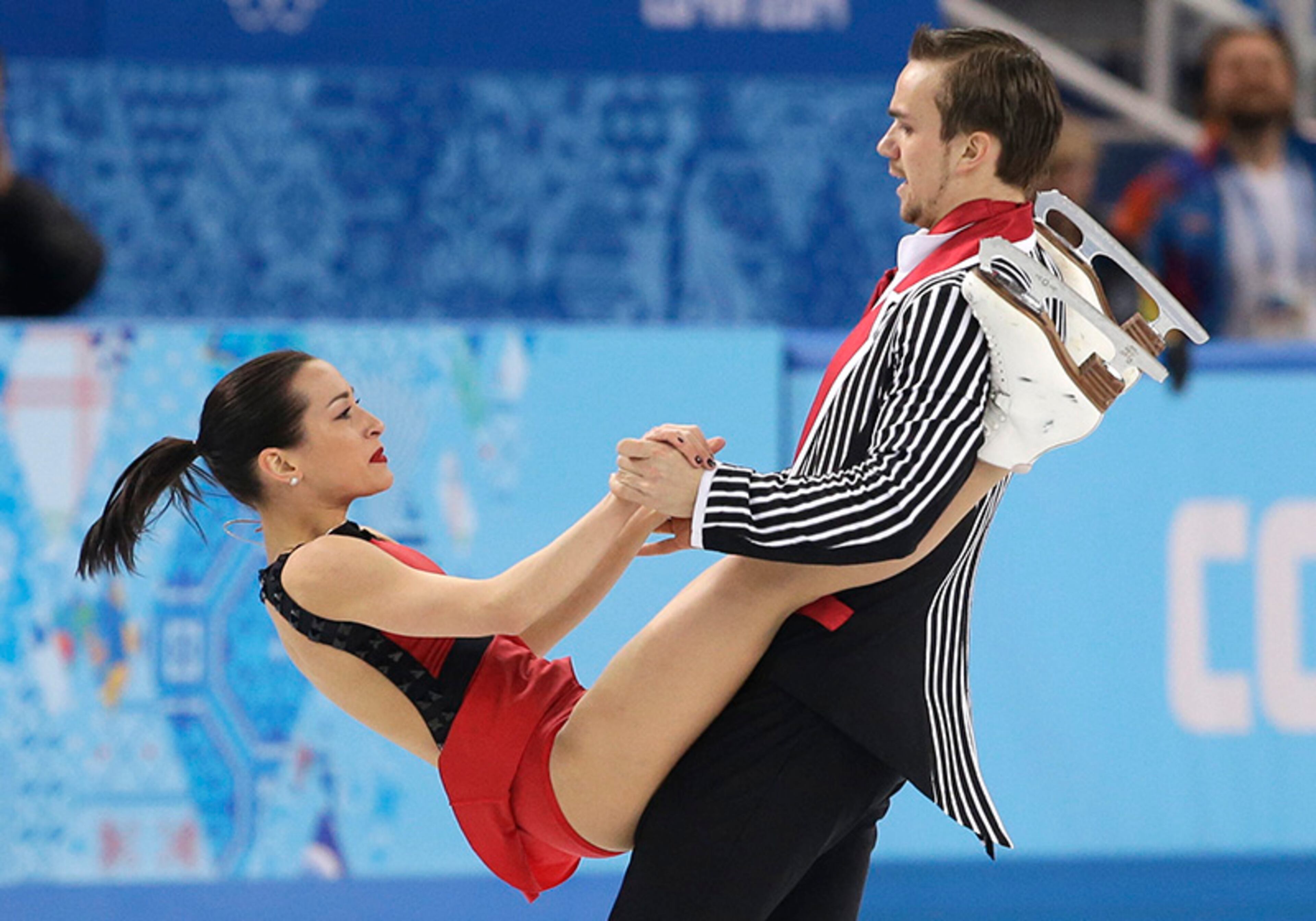 Ksenia Stolbova and Fedor Klimov of Russia compete in the pairs free skate figure skating competition at the Iceberg Skating Palace during the 2014 Winter Olympics, Wednesday, Feb. 12, 2014, in Sochi, Russia.