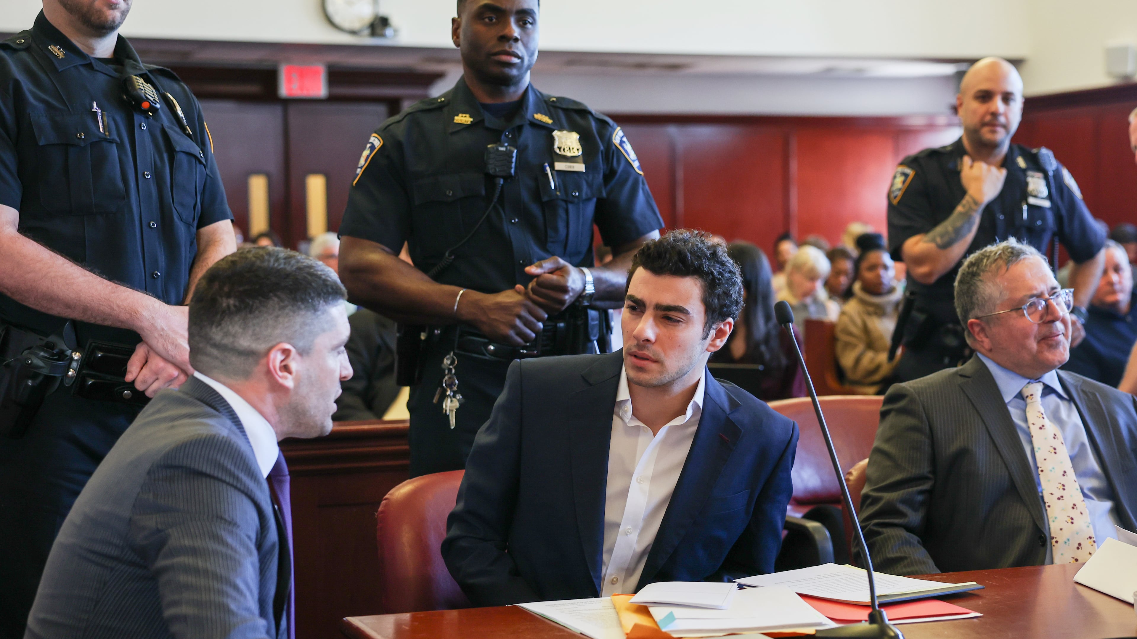 FILE - Luigi Mangione appears in Manhattan Criminal Court for an evidence hearing, Dec. 18, 2025, in New York. (Shannon Stapleton/Pool Photo via AP, File)
