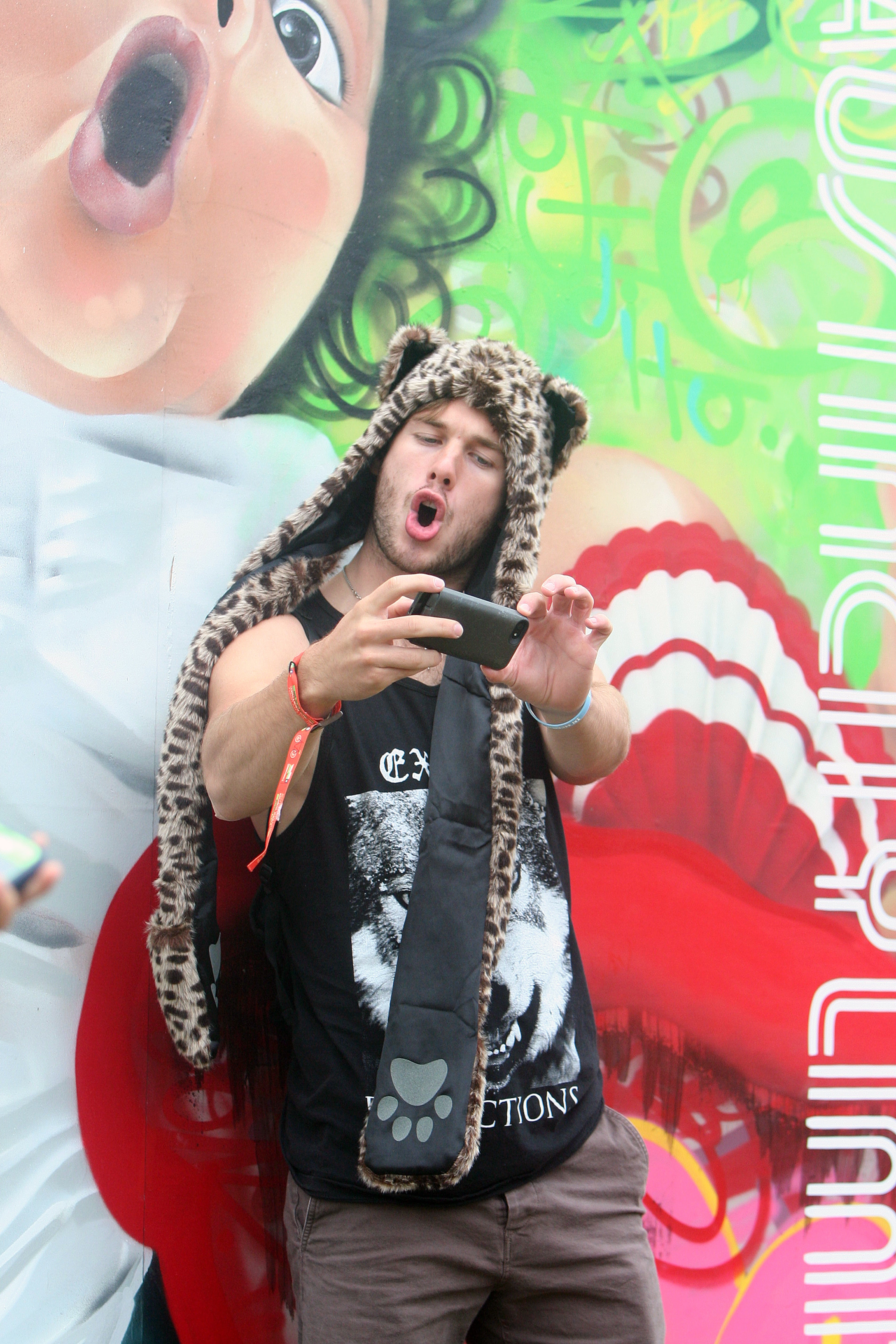 Austin Wadkins takes a selfie in front of a sign at Austin City Limits Music Festival, 10.11.14 MARCIAL GUAJARDO/ROUND ROCK LEADER