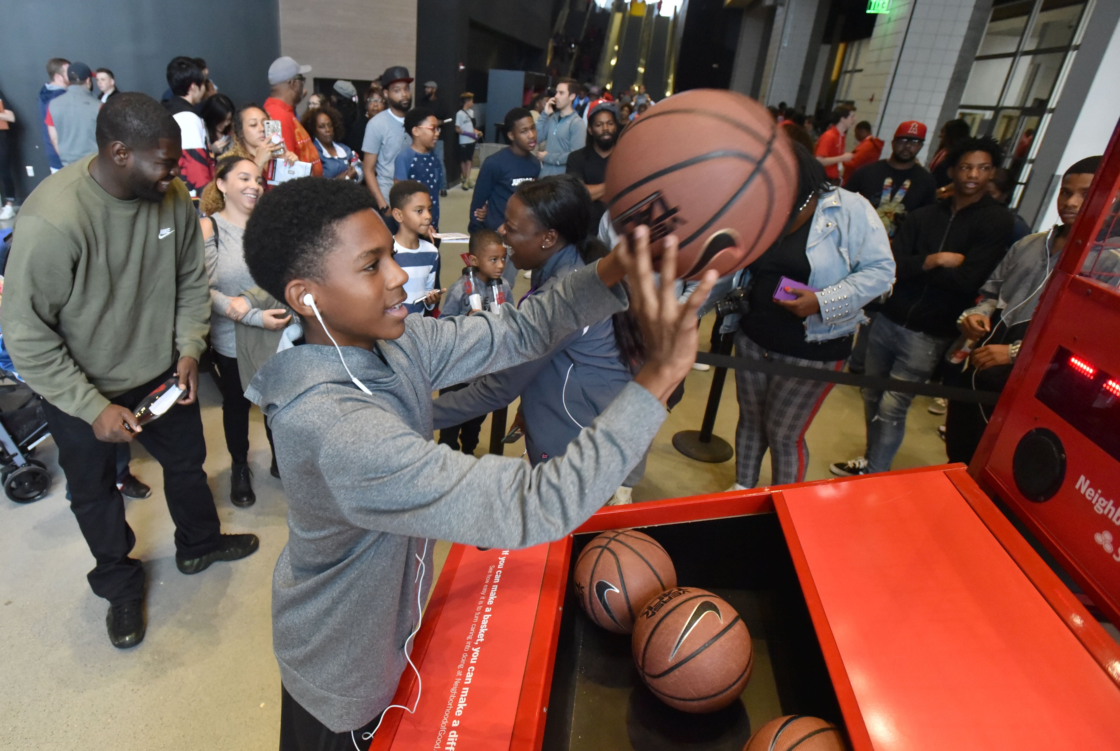Kaden Brown, 12, prepares to shoot while participating in fan activity during Saturday's event. (Hyosub Shin/hshin@ajc.com)