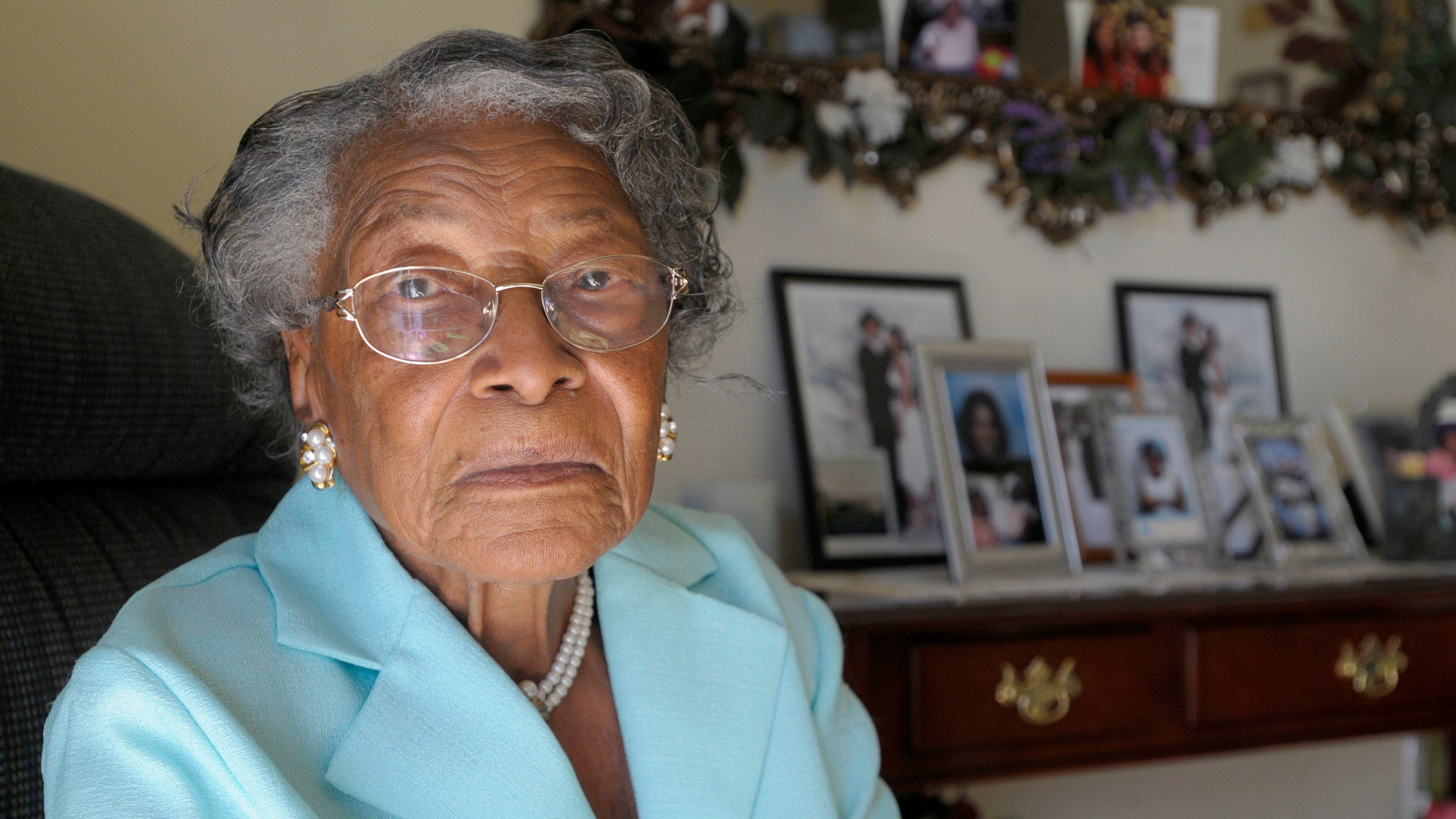 FILE - In this Oct. 7, 2010, file photo, Recy Taylor, now 91, sits in her home in Winter Haven, Fla. Oprah Winfreys barnstormer of a speech at the Golden Globes highlighted the story of Taylor, a black Alabama woman who was raped by six white men in 1944. Winfrey told the audience that Taylor was a name they should know. (AP Photo/Phelan M. Ebenhack, File)