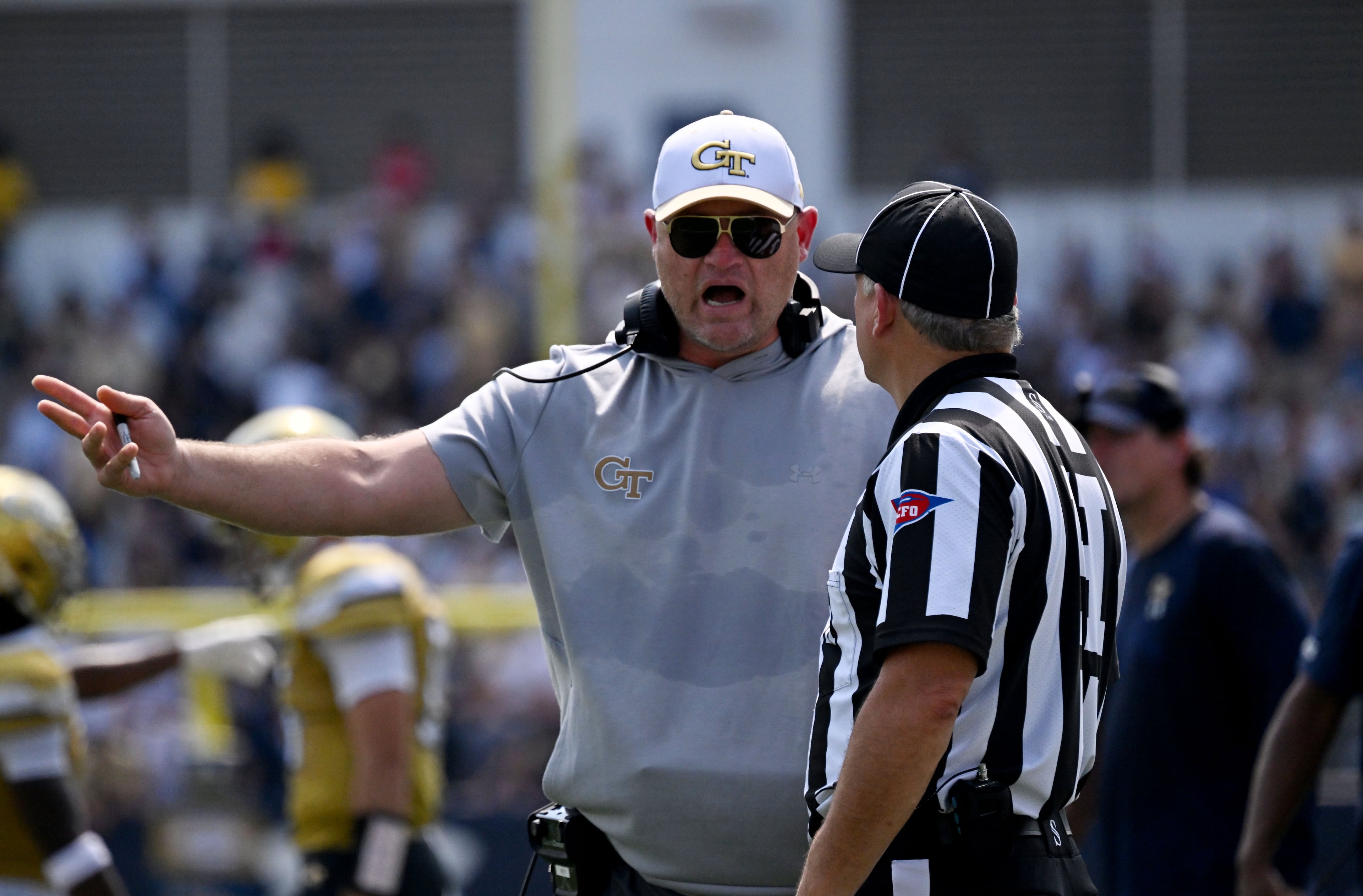 Georgia Tech head coach Brent Key appeals to a referee during the first half in an NCAA college football game at Bobby Dodd Stadium on Saturday, Sept. 19, 2026, in Atlanta. (Hyosub Shin/AJC)