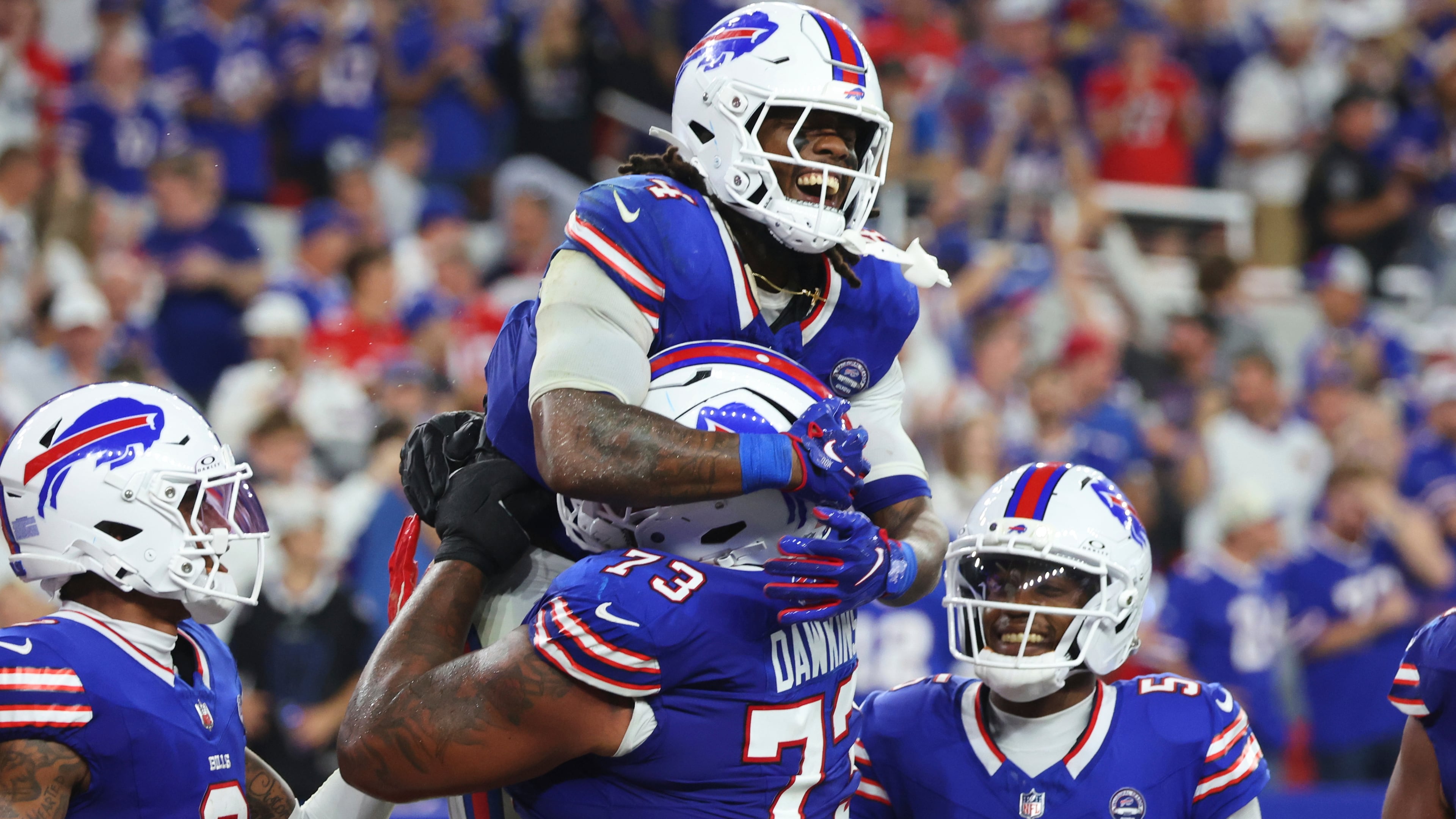 Buffalo Bills running back James Cook (4) celebrates his rushing touchdown against the Detroit Lions during the second half of an NFL football game in Orchard Park, N.Y., Thursday, Sept. 17, 2026. (AP Photo/Jeffrey T. Barnes )