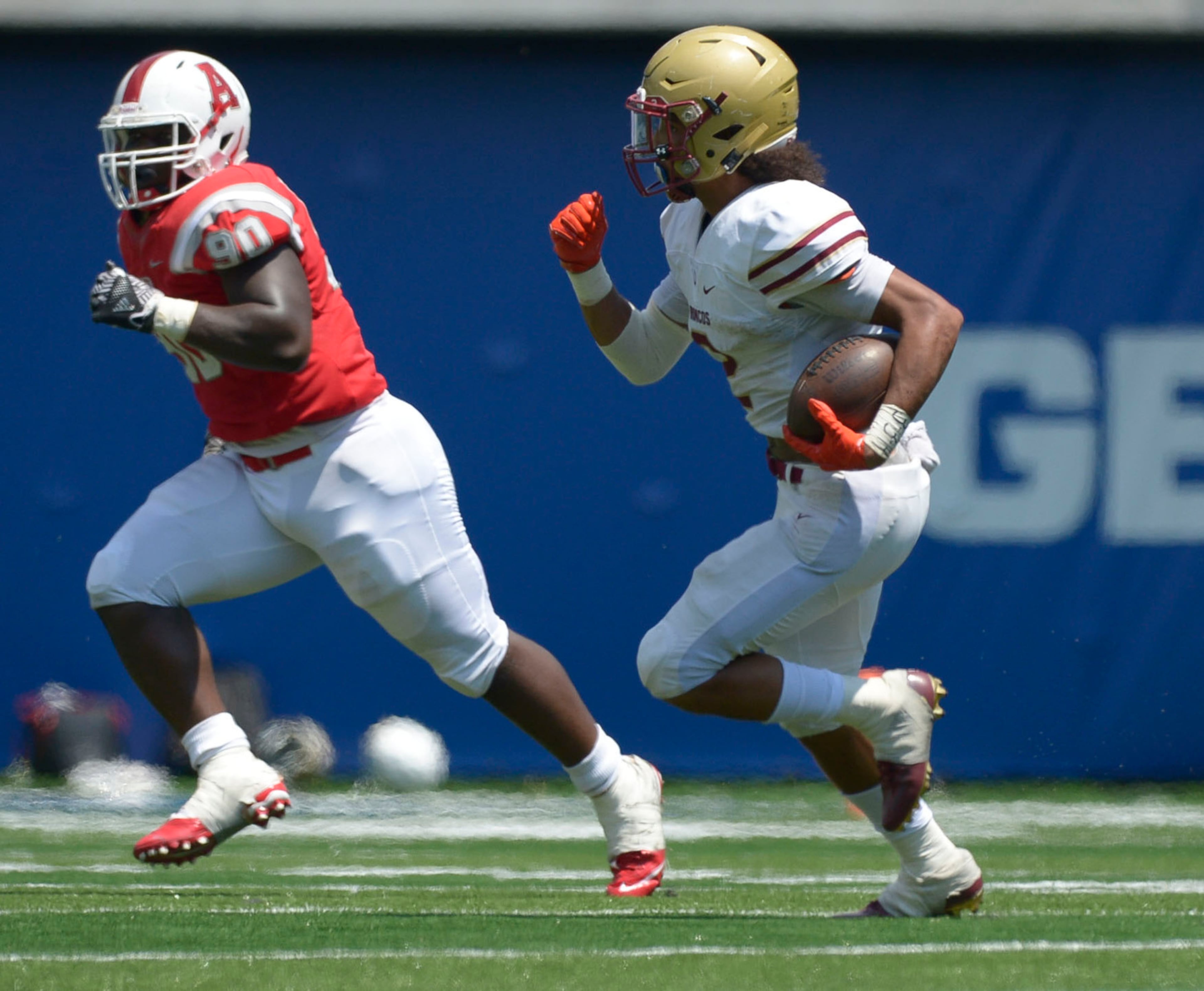 Atlanta, Ga. -- Brookwood senior WR Matthew Hill (2) carries the ball for yardage as Archer senior DL Will Choloh Jr. (90) defends in the first half of their at Georgia State Stadium Saturday, August 19, 2017.