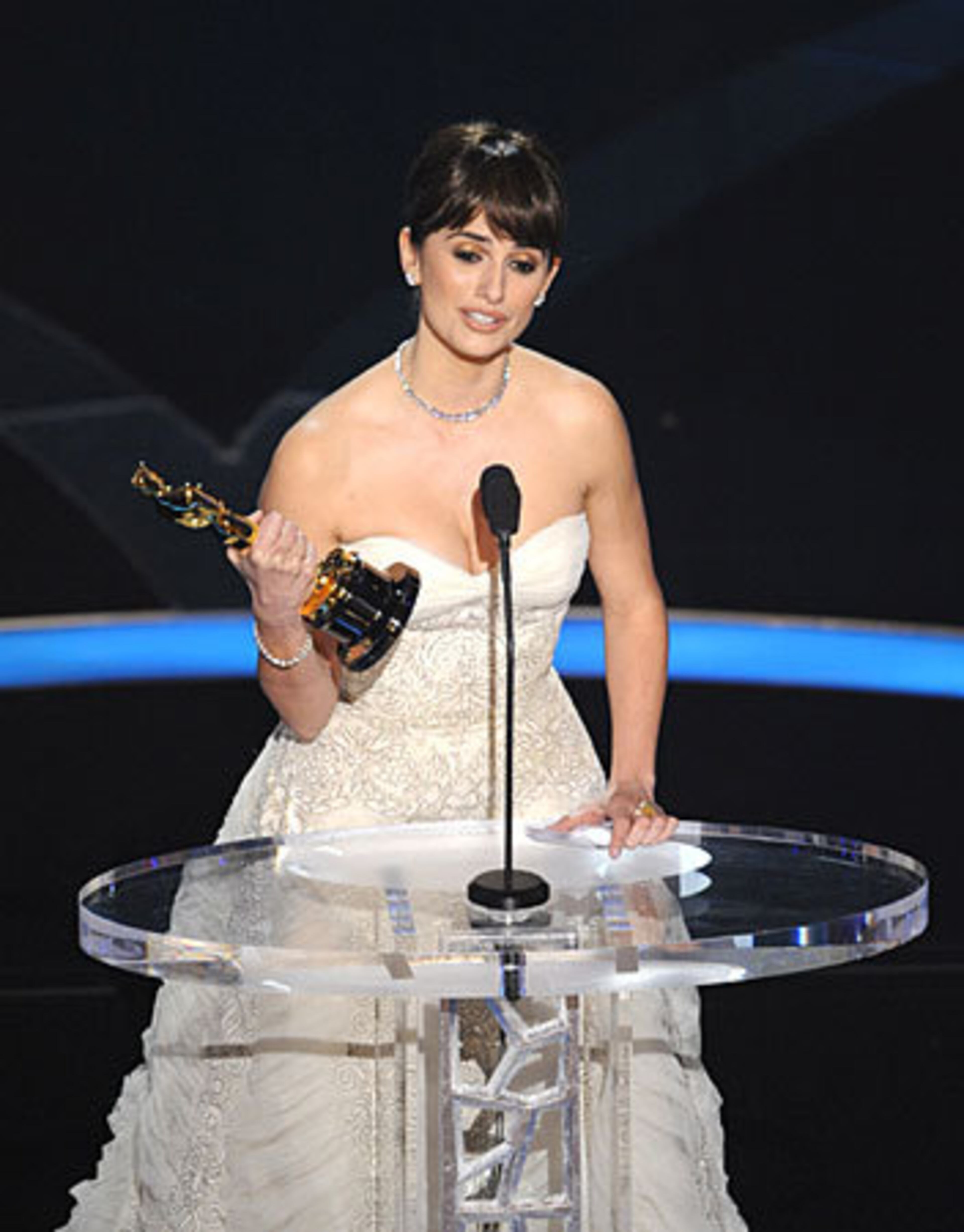 Spanish actress Penelope Cruz accepts the Oscar for best supporting actress for her work in "Vicky Cristina Barcelona."