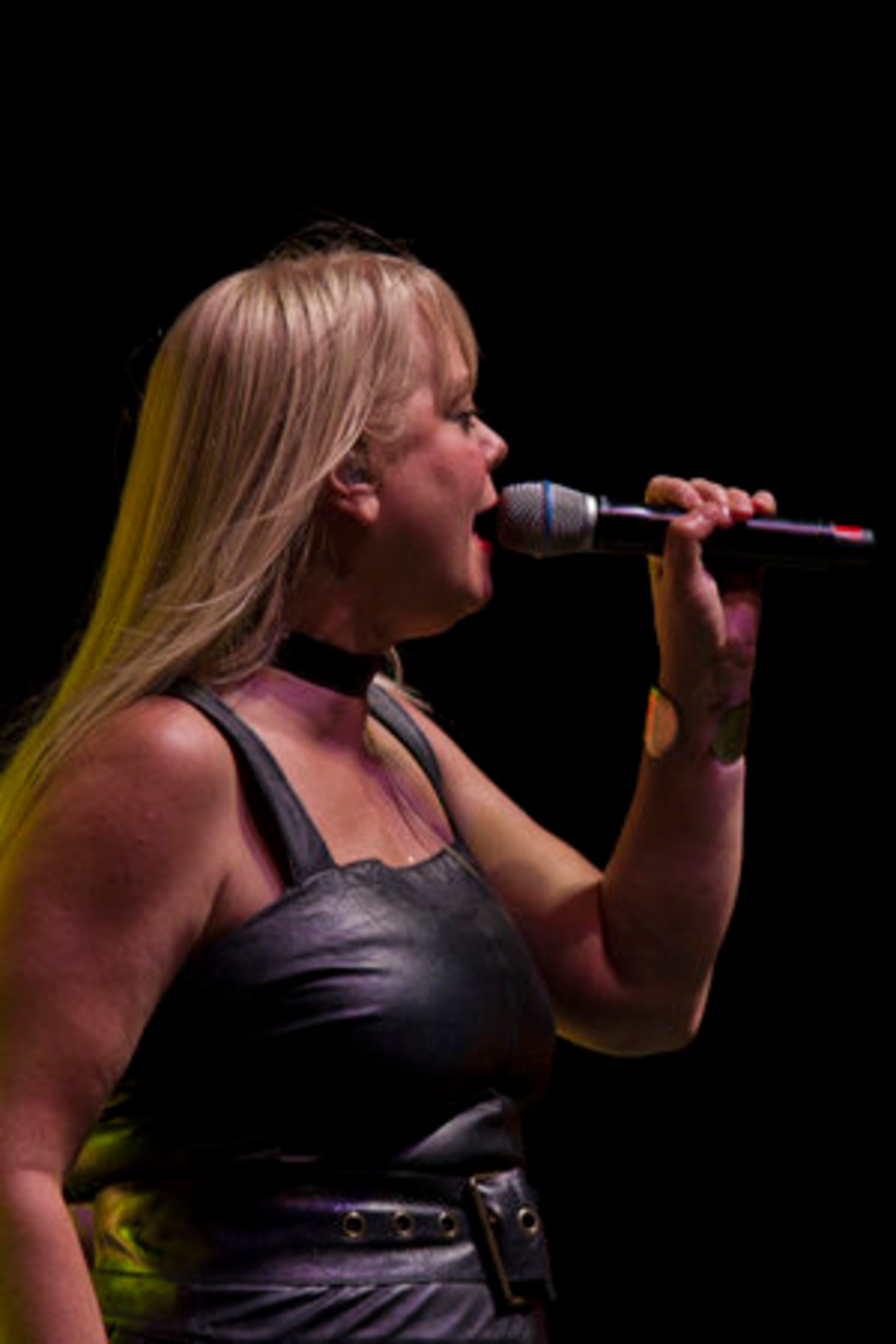 Cindy Wilson sings during the band's third song, "Private Idaho."