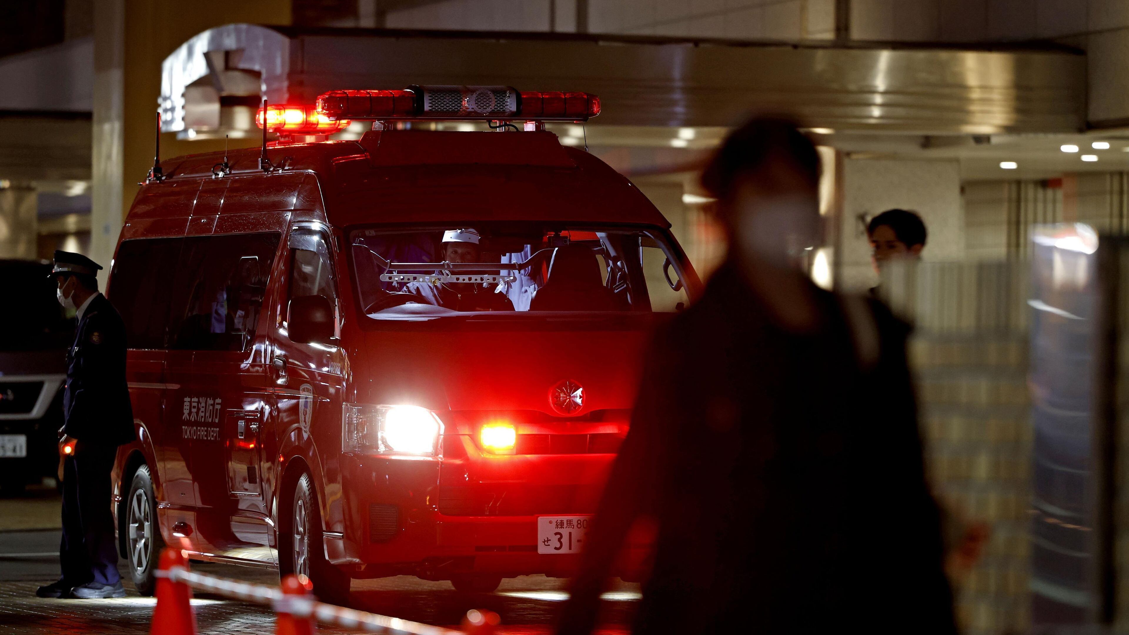 Police and emergency responders are on the scene of a deadly stabbing in downtown Tokyo on Thursday, March 26, 2026. (Kyodo News via AP)