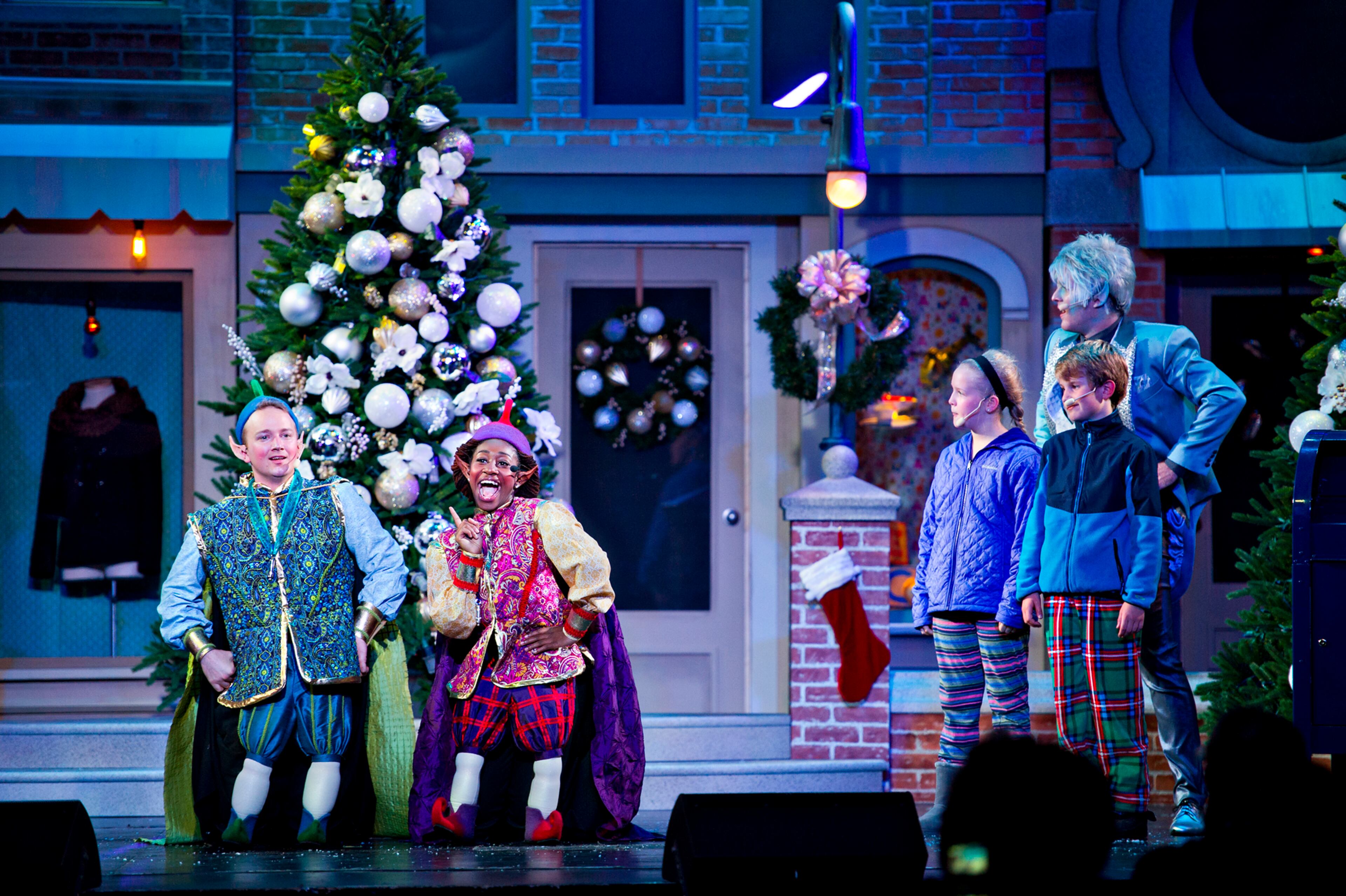 Chase Davidson (left), Somalia Ra-Min, Kendall Wilkes, A.J. Klopach and Evan Bauer perform on stage at Six Flags Over Georgia in Austell on Friday, November 21, 2014. The park has been decorated in 10 sections of holiday lights for the first time since 1990. Holiday in the Park runs through Jan.4, 2015. JONATHAN PHILLIPS / SPECIAL