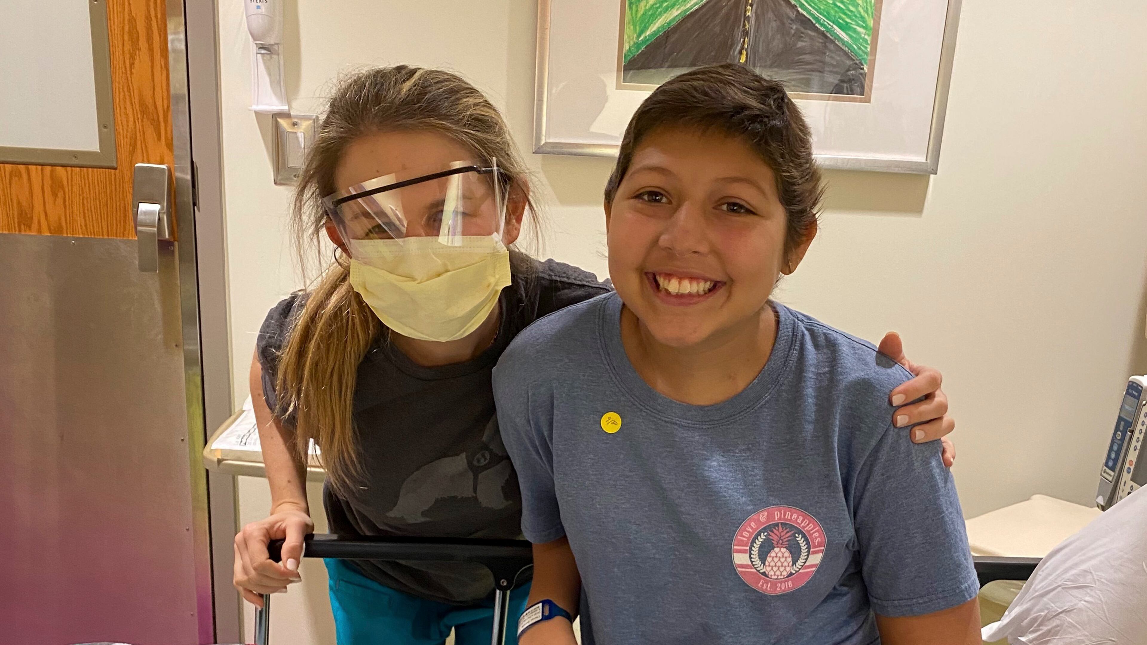 Amelia Ballard, a registered nurse at Children's Healthcare of Atlanta, and a cancer survivor, always knew she wanted to work in pediatric oncology. Here she is with Dani Cuevas, who is 15. (Courtesy of Children’s Healthcare of Atlanta)