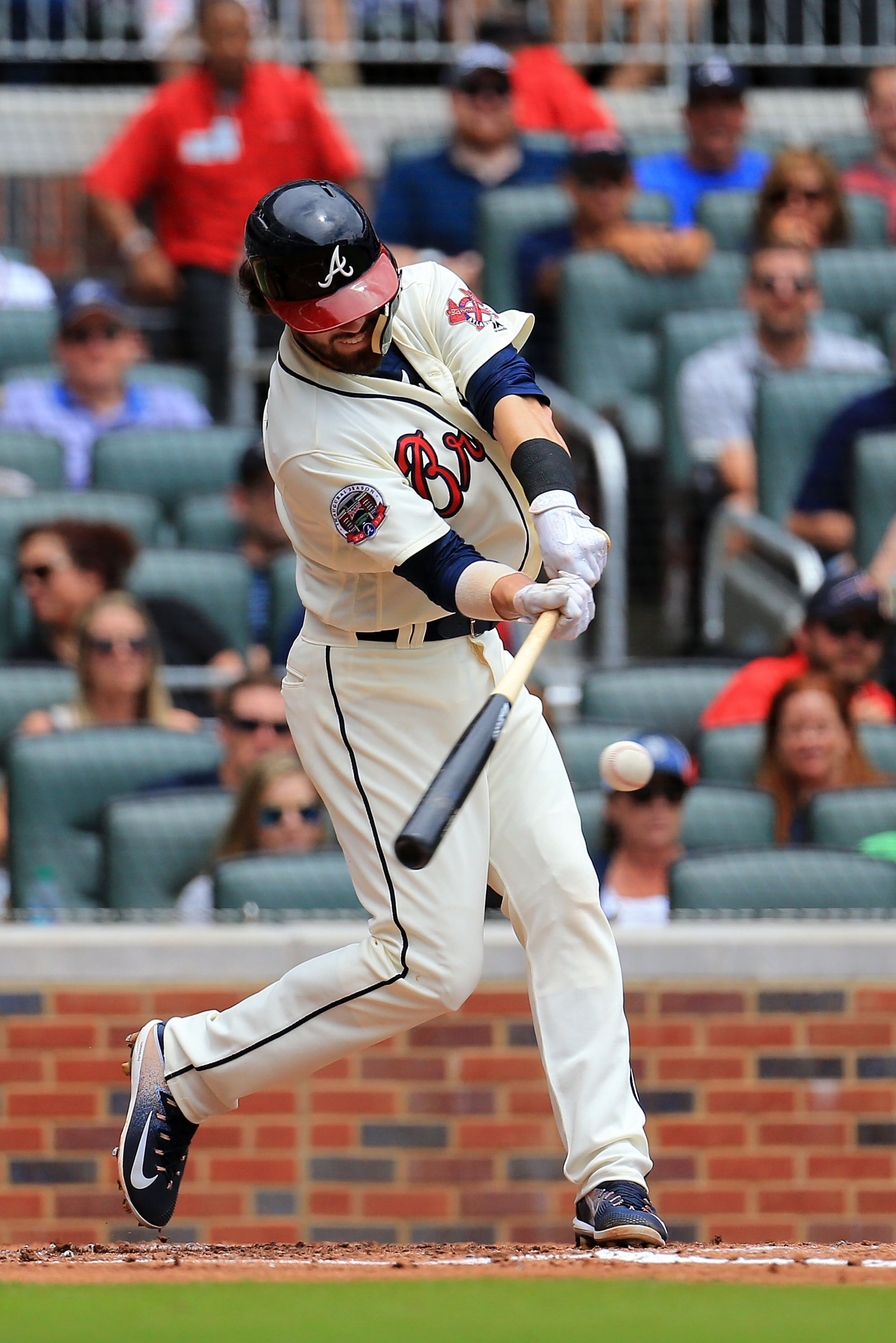 ATLANTA, GA - JULY 16: Dansby Swanson #7 of the Atlanta Braves drives in a run during the second inning against the Arizona Diamondbacks at SunTrust Park on July 16, 2017 in Atlanta, Georgia. (Photo by Daniel Shirey/Getty Images)
