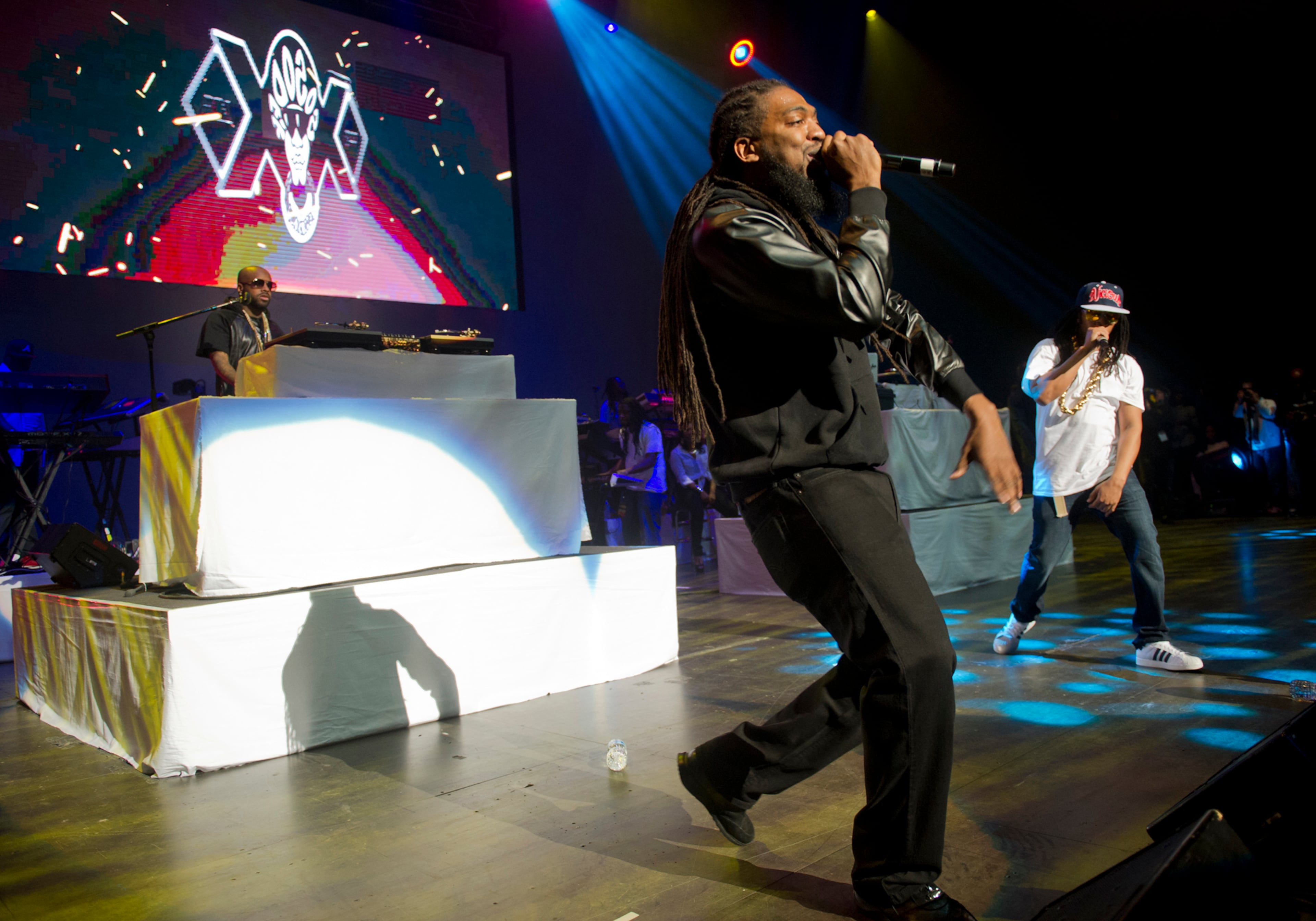 Pastor Troy (center) performs with Lil Jon and Jermaine Dupri (left) at the Fox Theatre in Atlanta during the So So Def 20th Anniversary Concert Saturday, Feb, 23, 2013.