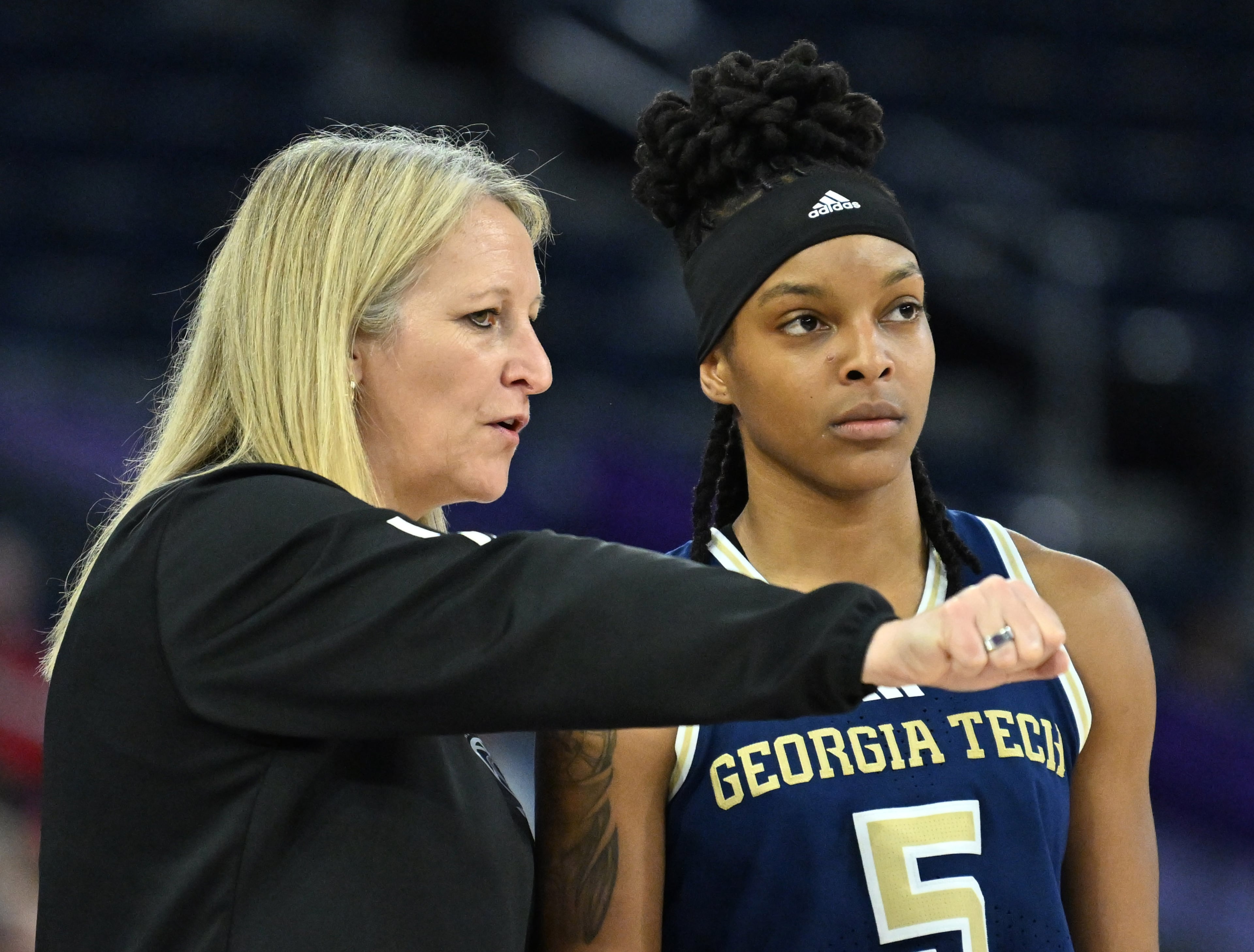 Georgia Tech head coach Karen Blair (left) instructs guard Catherine Alben during the ACC women’s basketball tournament at Gas South Arena on Thursday, March 5, 2026, in Duluth. (Hyosub Shin/AJC)