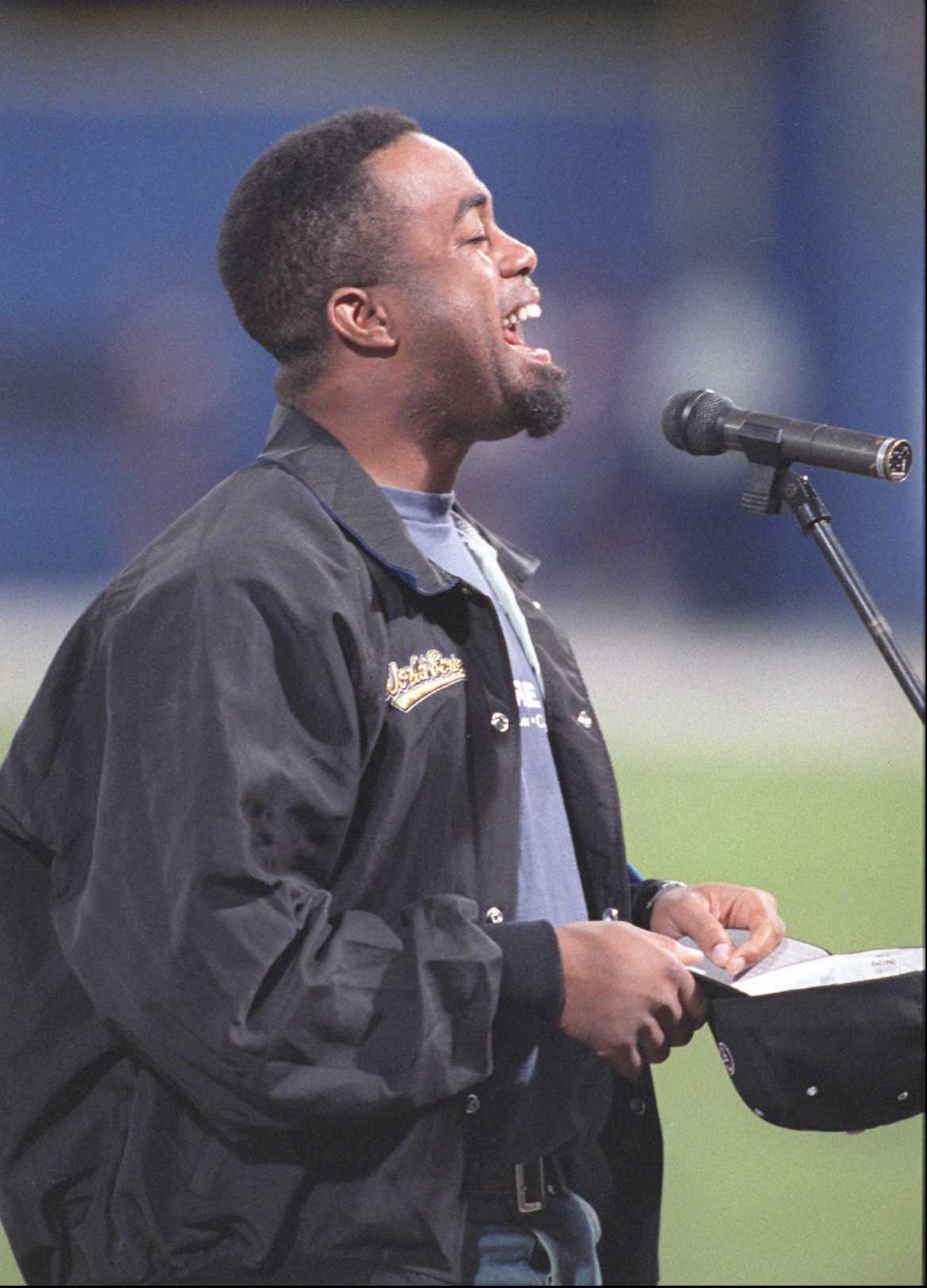 Darius Rucker of 'Hootie & the Blowfish' sings the national anthem before game 1 of the World Series.