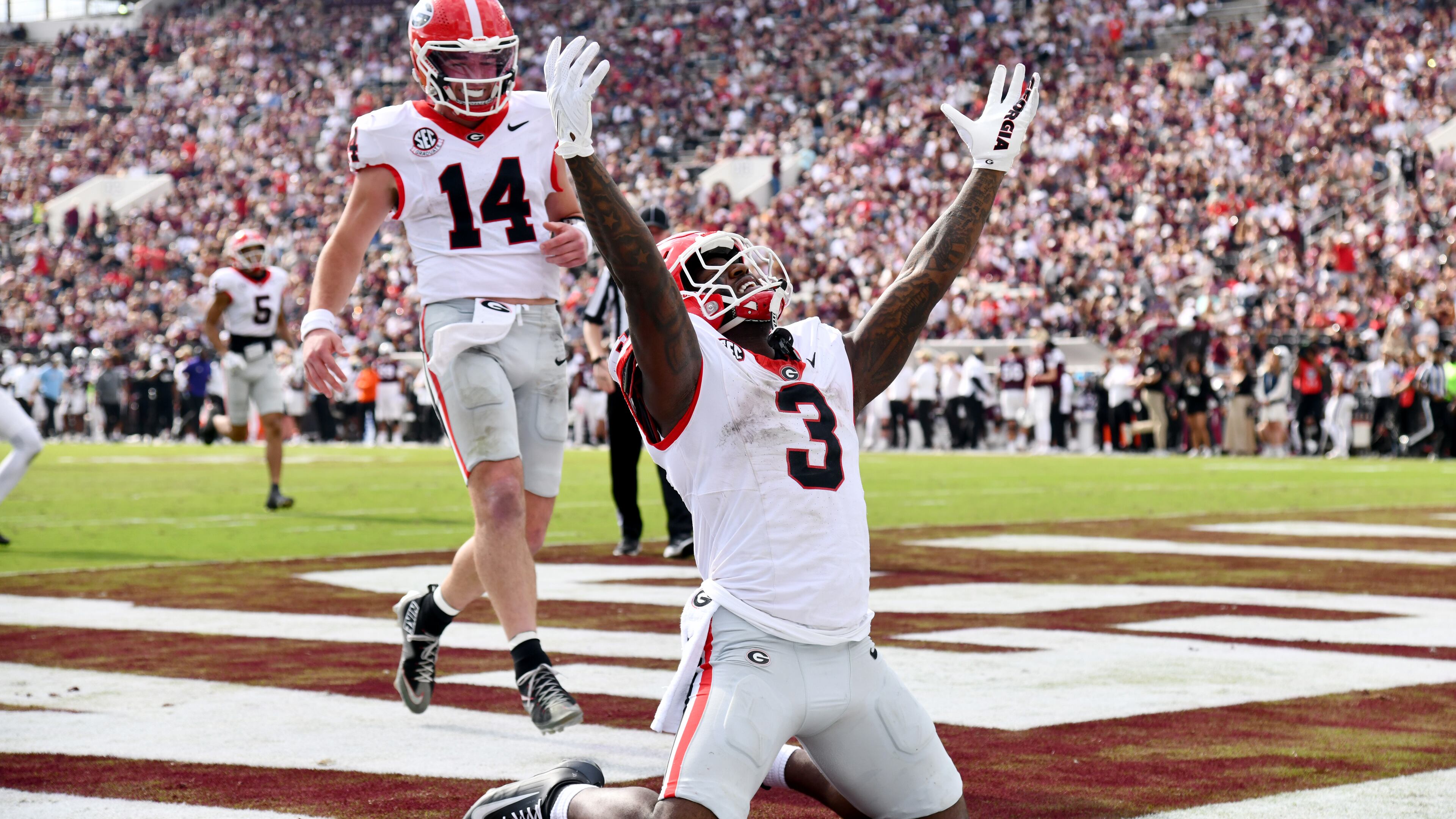 Georgia running back Nate Frazier celebrates after scoring a touchdown during the second half at Davis Wade Stadium on Saturday, Nov. 8, 2025, in Starkville, Miss. There has been speculation that Texas Tech could pass Georgia in the College Football Playoff rankings. (Hyosub Shin/AJC)