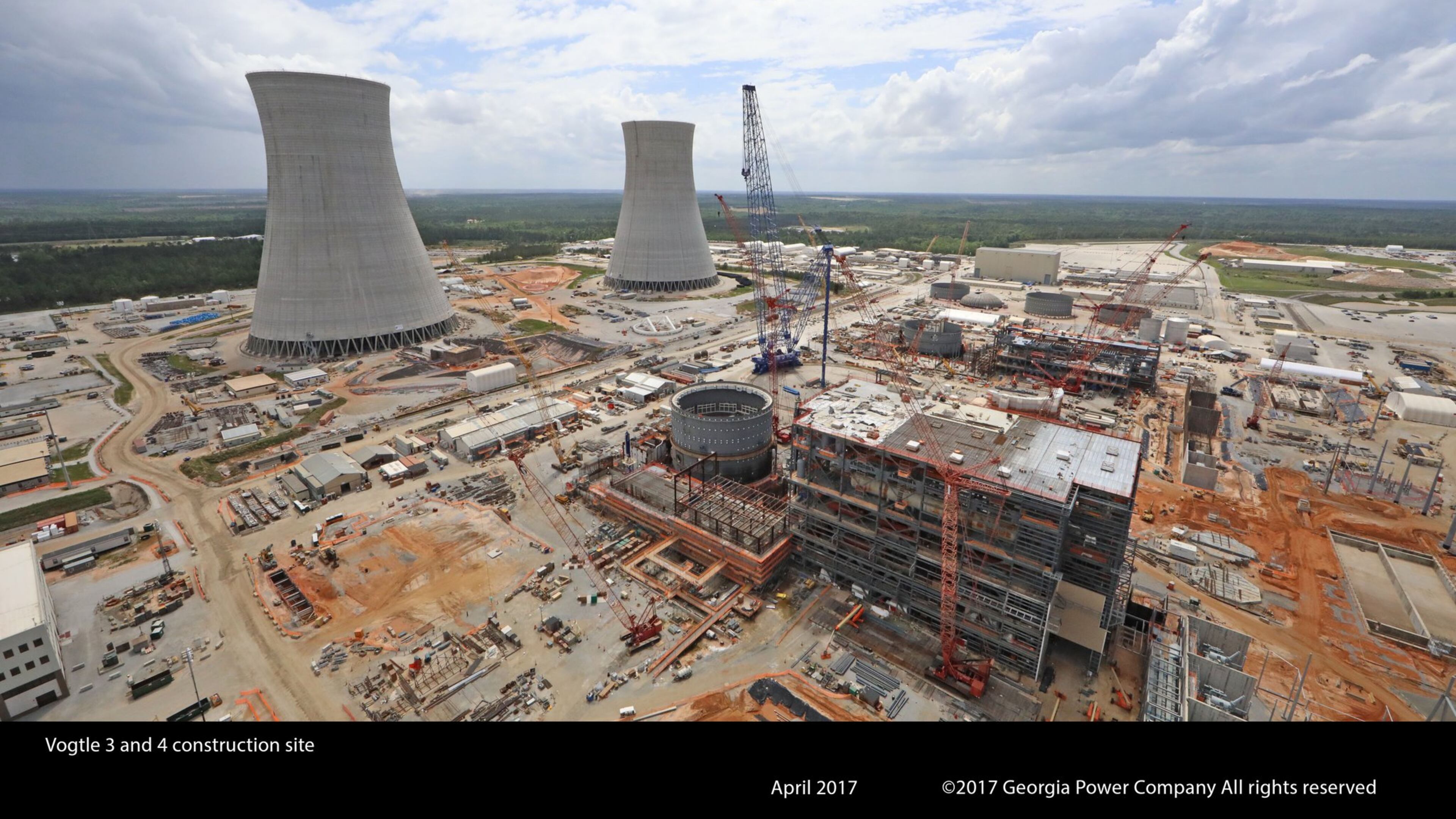 The cooling towers for Plant Vogtle’s planned new nuclear reactors rise above the Georgia Power construction sites near Augusta, Ga. GEORGIA POWER